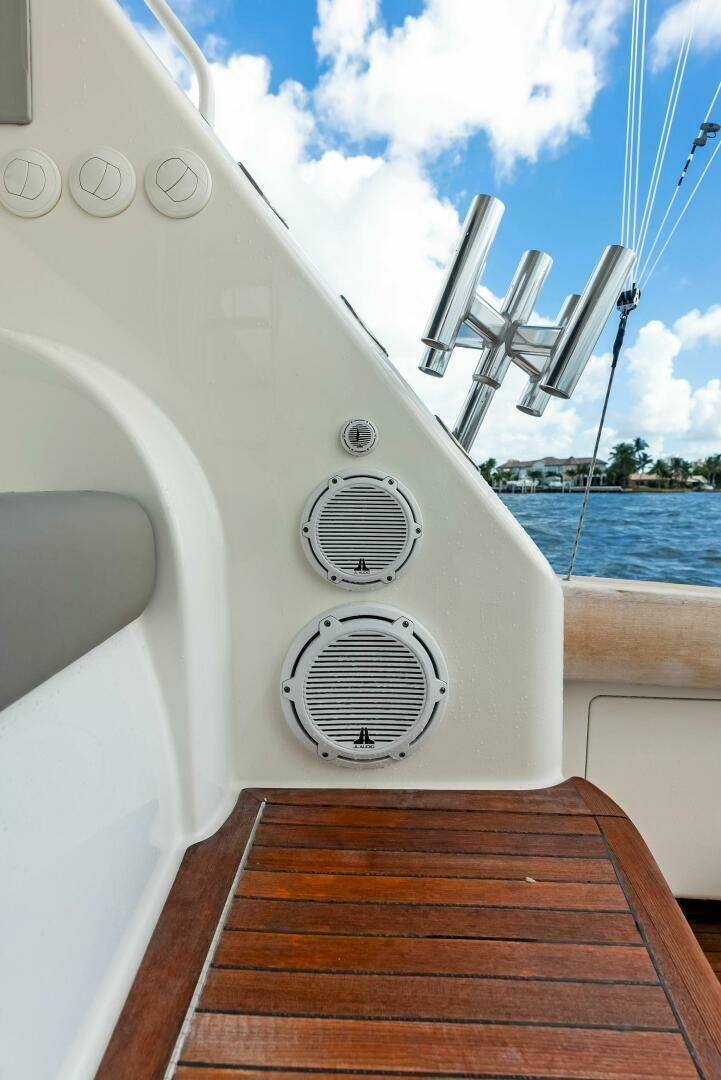 a white boat with a wooden deck aboard PRINCESS LILY Yacht for Sale