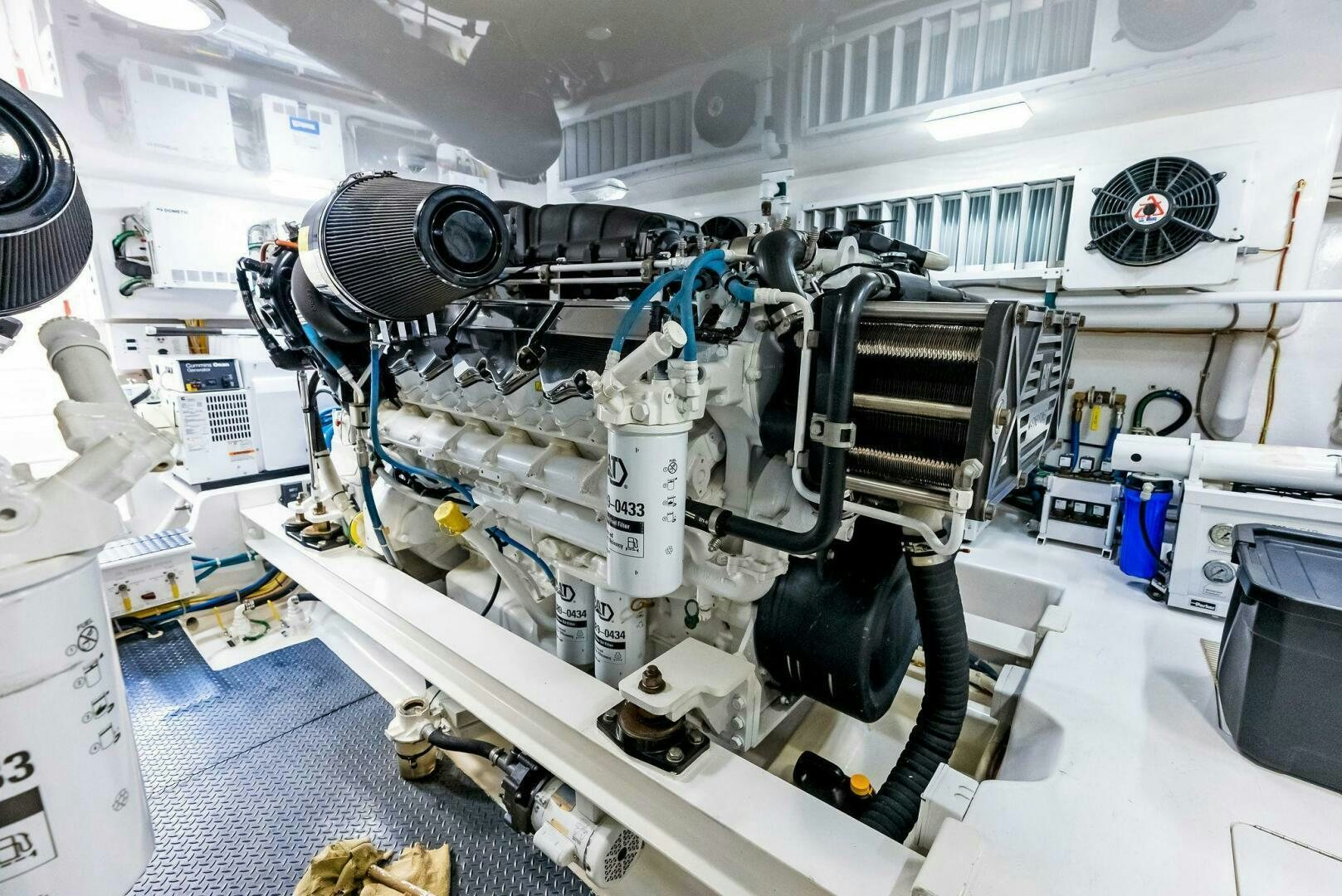 a machine with a large metal cylinder aboard PRINCESS LILY Yacht for Sale