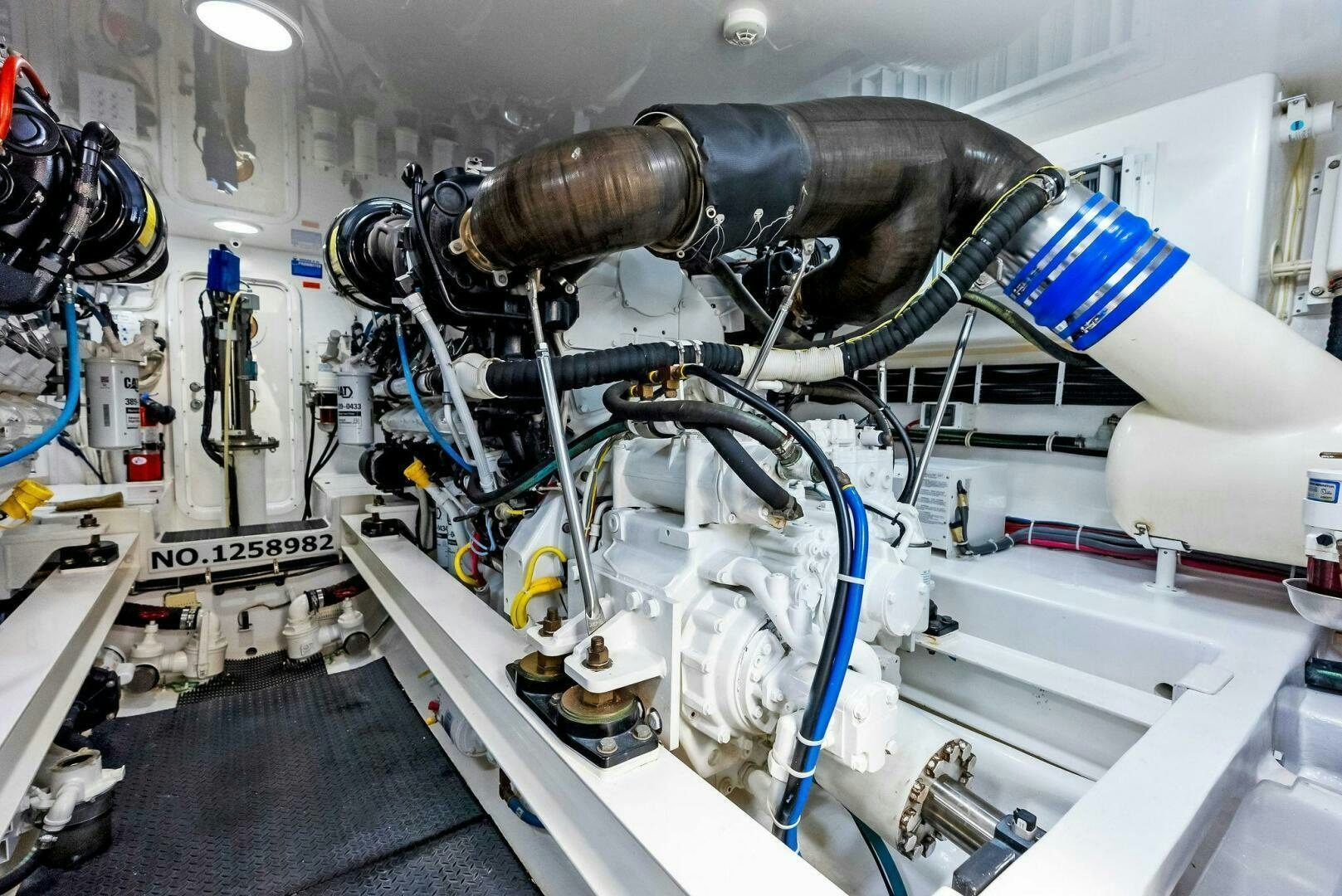 a machine with a large metal pipe aboard PRINCESS LILY Yacht for Sale