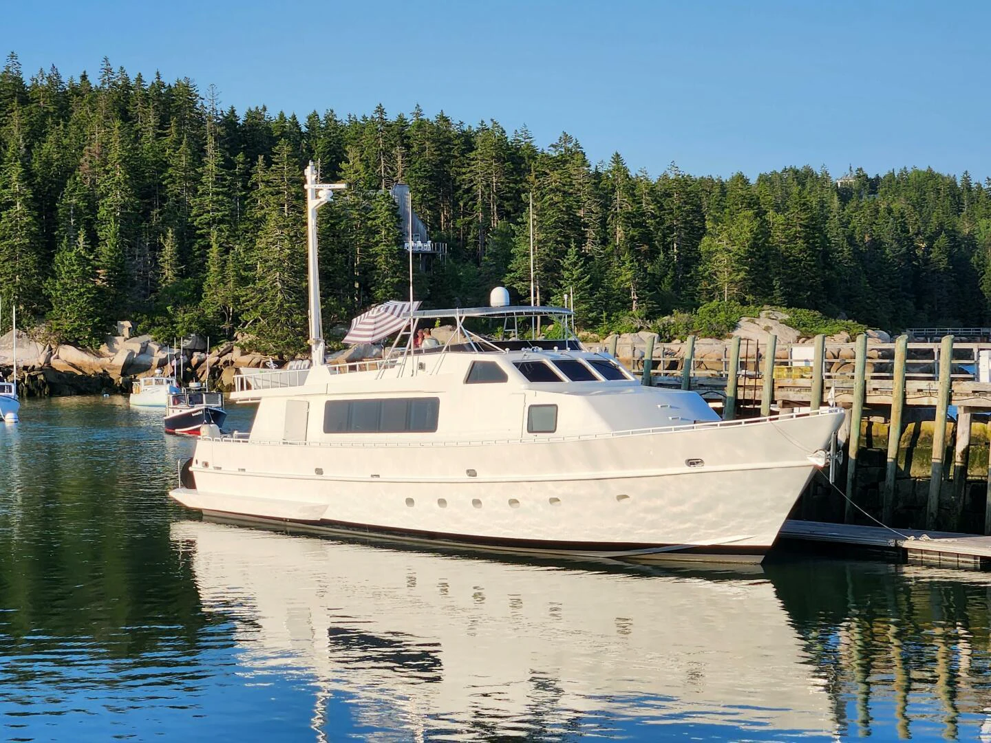 a boat docked at a pier aboard PIER PRESSURE Yacht for Sale