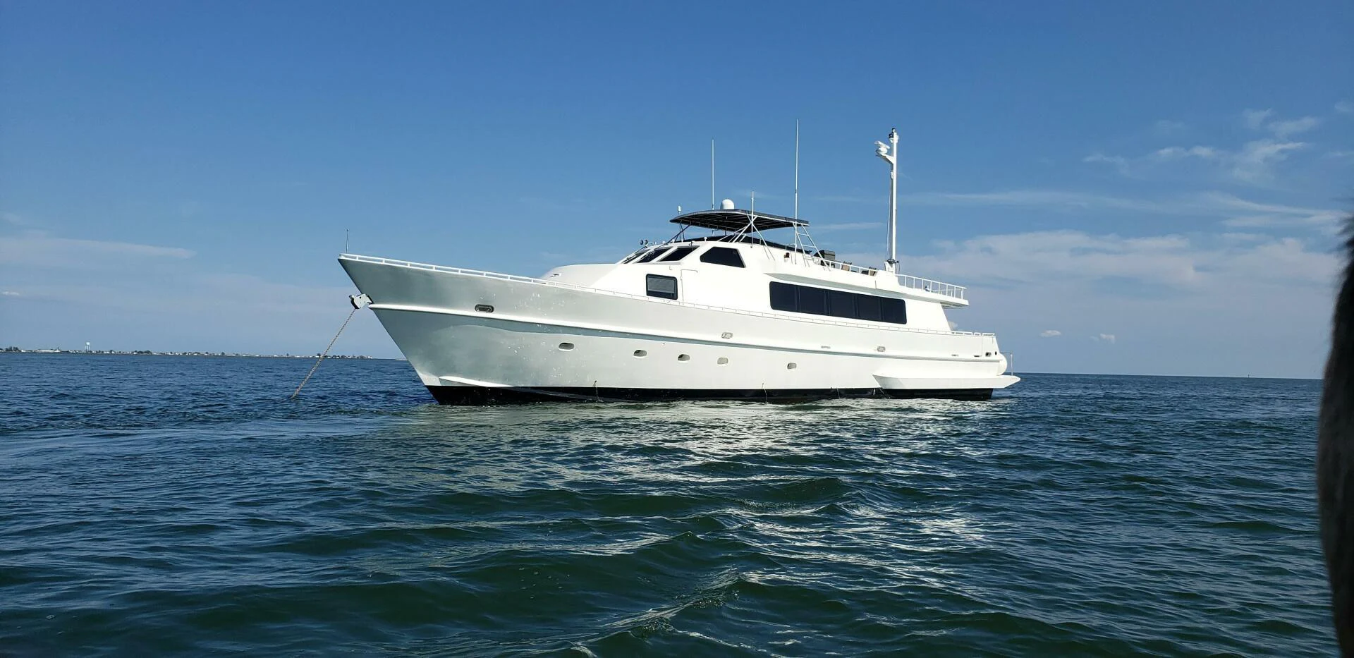 a white yacht in the water aboard PIER PRESSURE Yacht for Sale