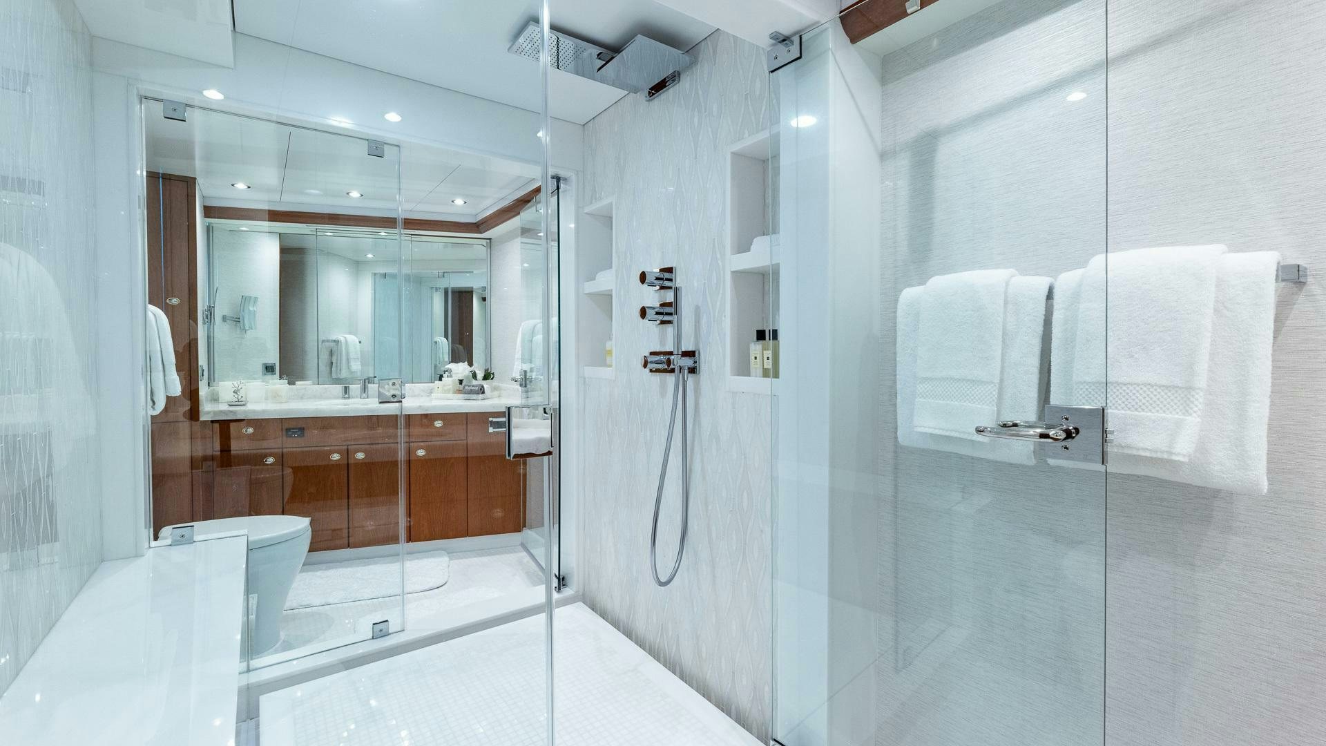 a bathroom with a shower and sink aboard NO SHORTCUTS Yacht for Sale