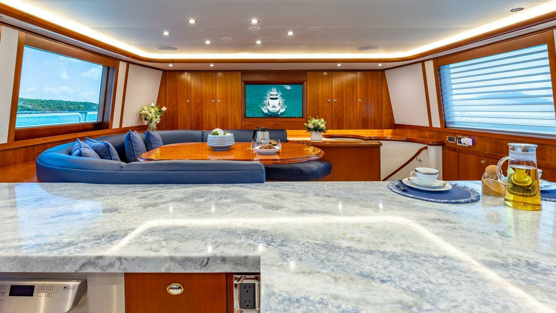 a large kitchen with a large island aboard NO SHORTCUTS Yacht for Sale