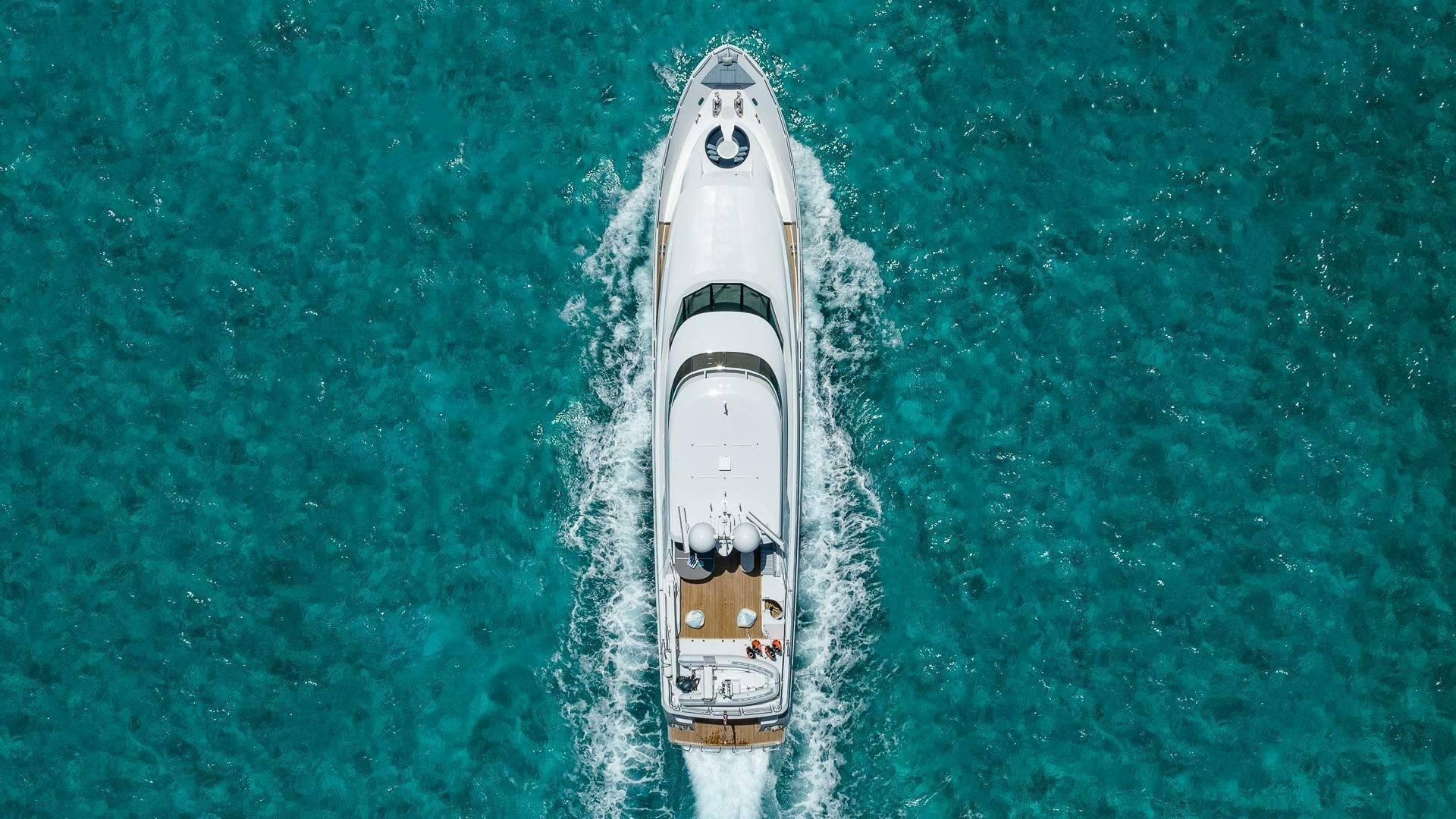 a white boat in the water aboard NO SHORTCUTS Yacht for Sale