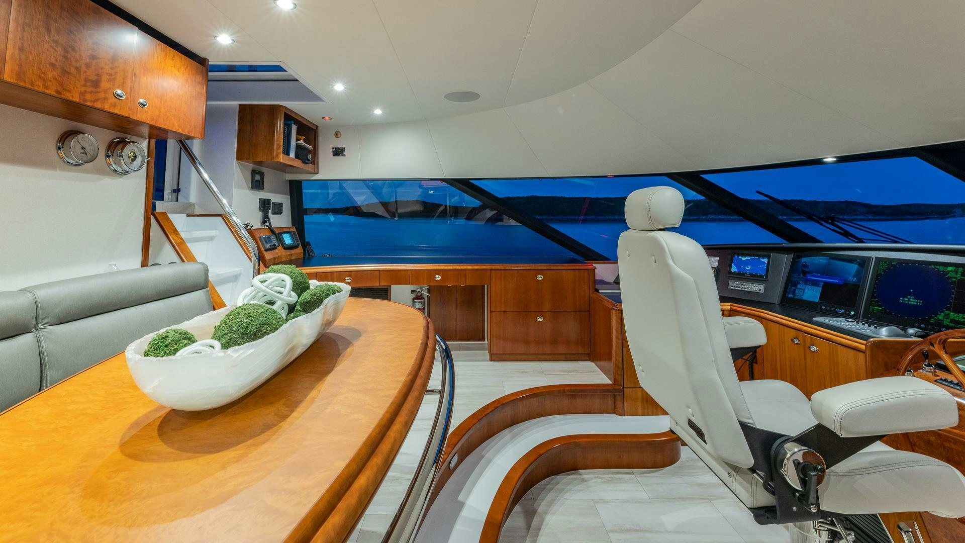 a room with a table and chairs aboard NO SHORTCUTS Yacht for Sale