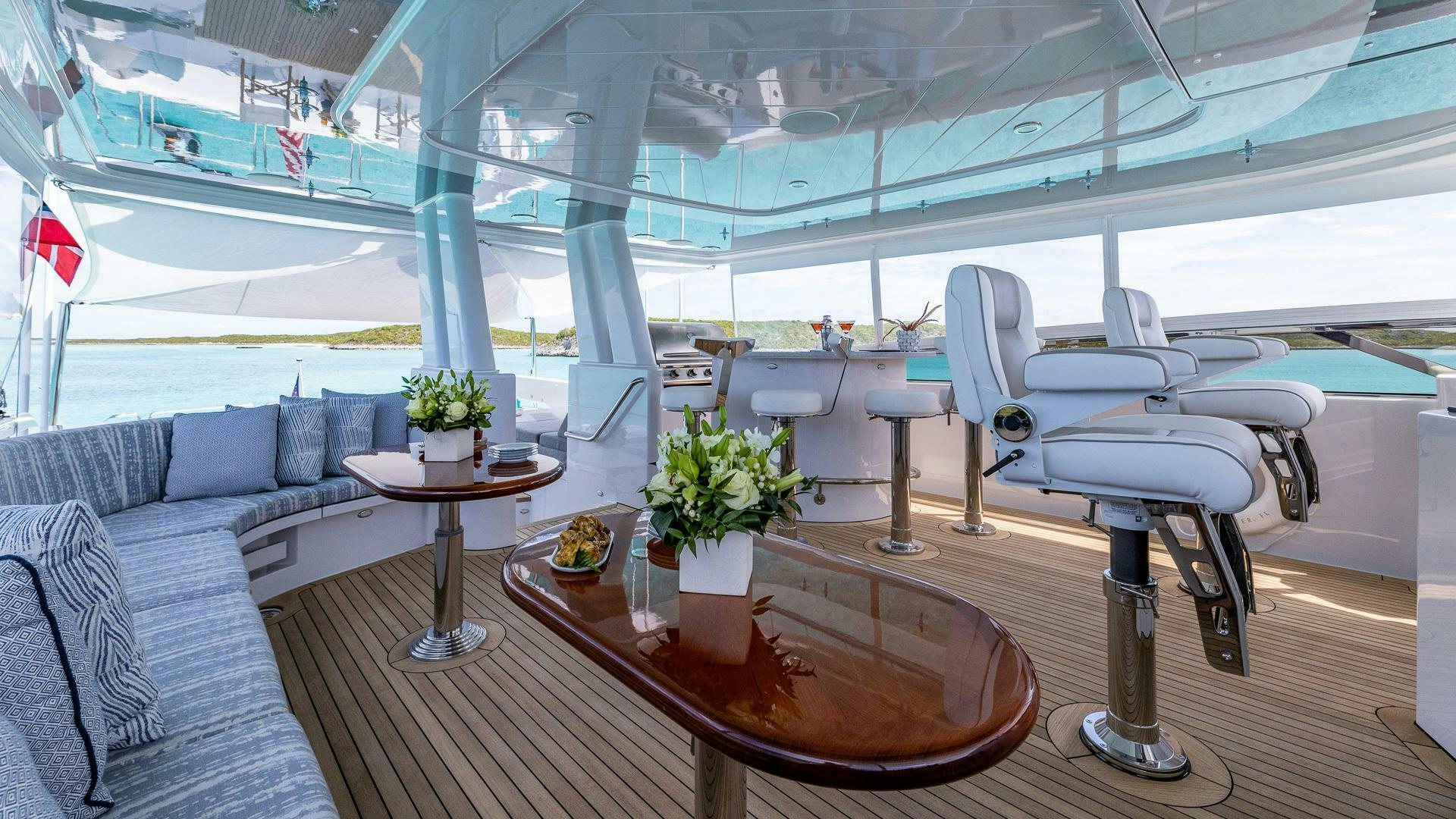 a room with a table and chairs aboard NO SHORTCUTS Yacht for Sale