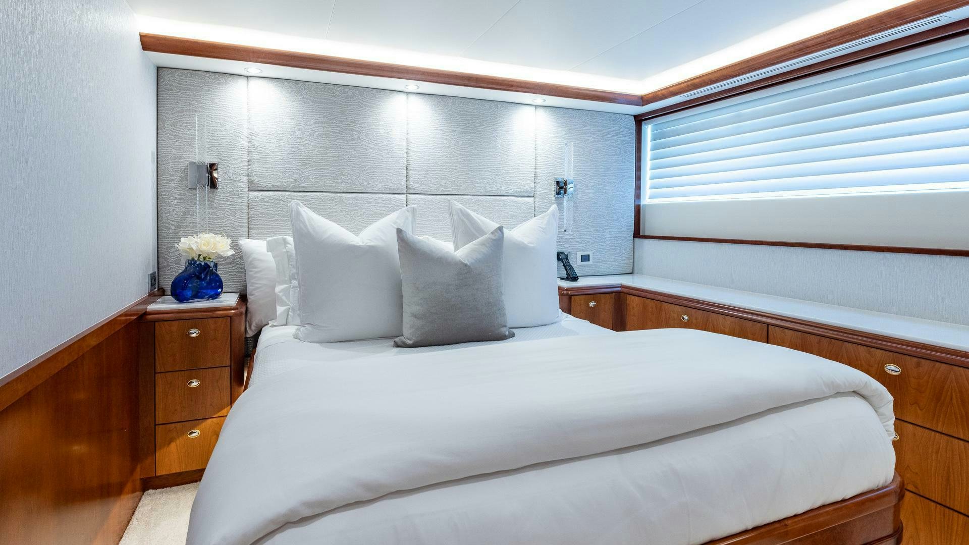 a bed with white sheets aboard NO SHORTCUTS Yacht for Sale