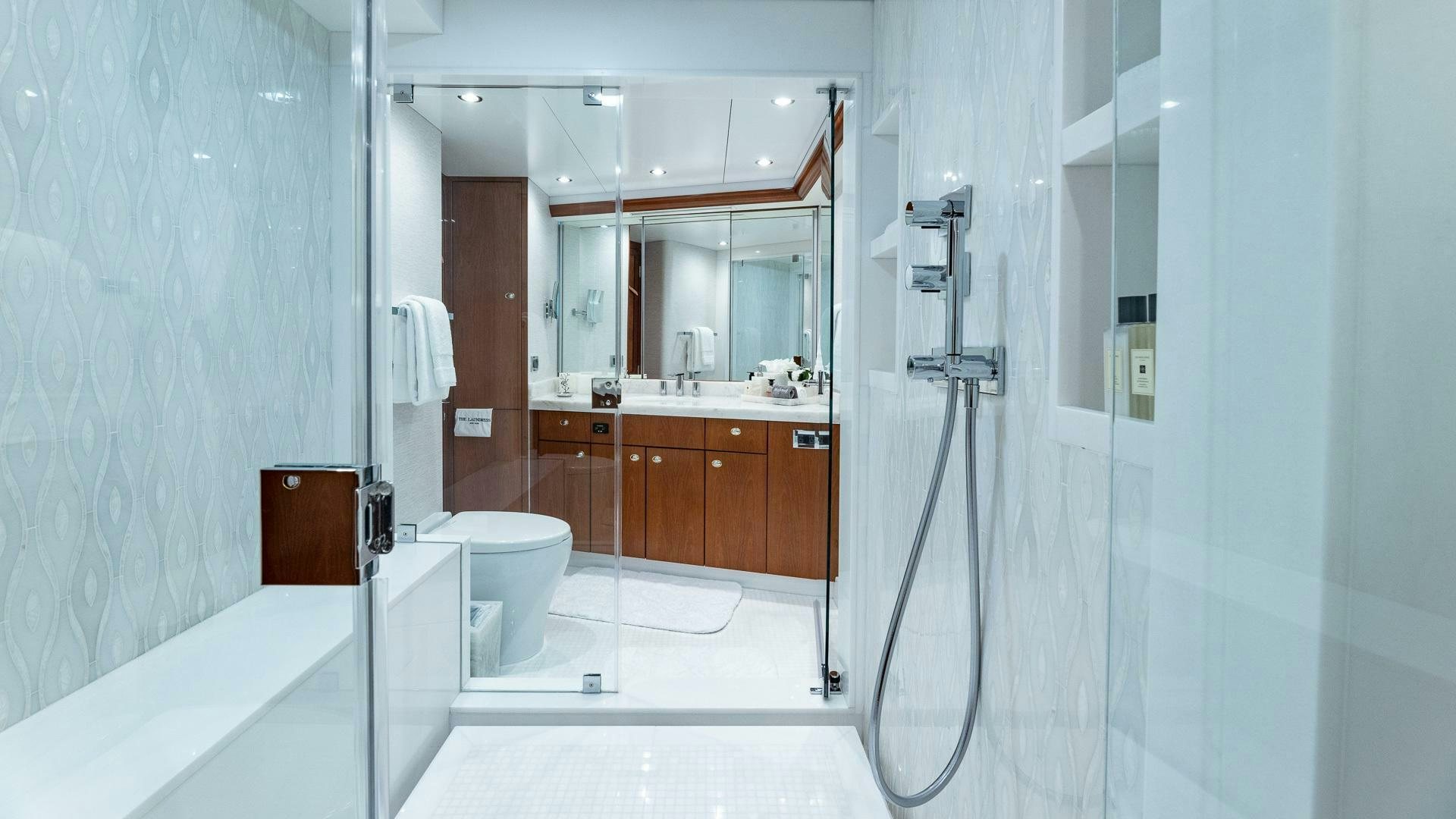 a bathroom with a sink and a toilet aboard NO SHORTCUTS Yacht for Sale