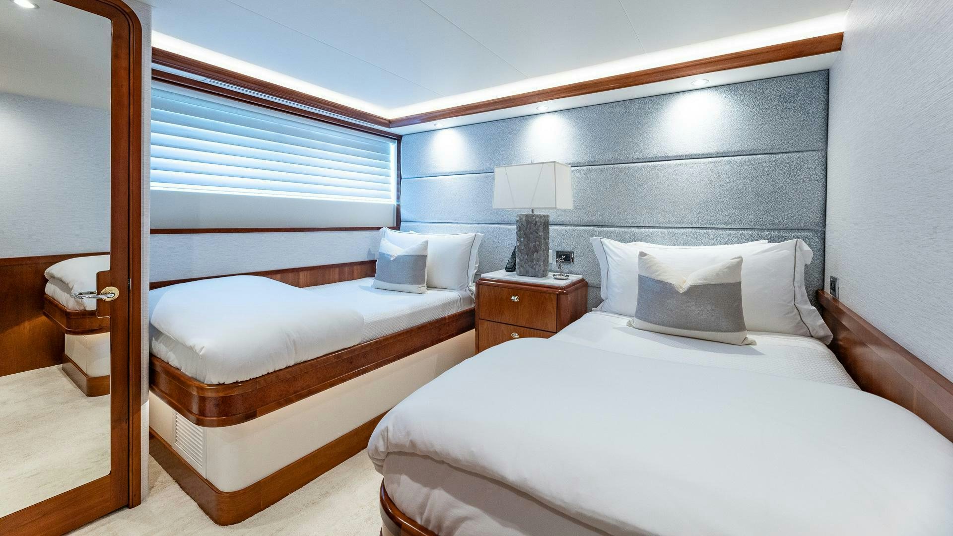a couple of beds in a hotel room aboard NO SHORTCUTS Yacht for Sale