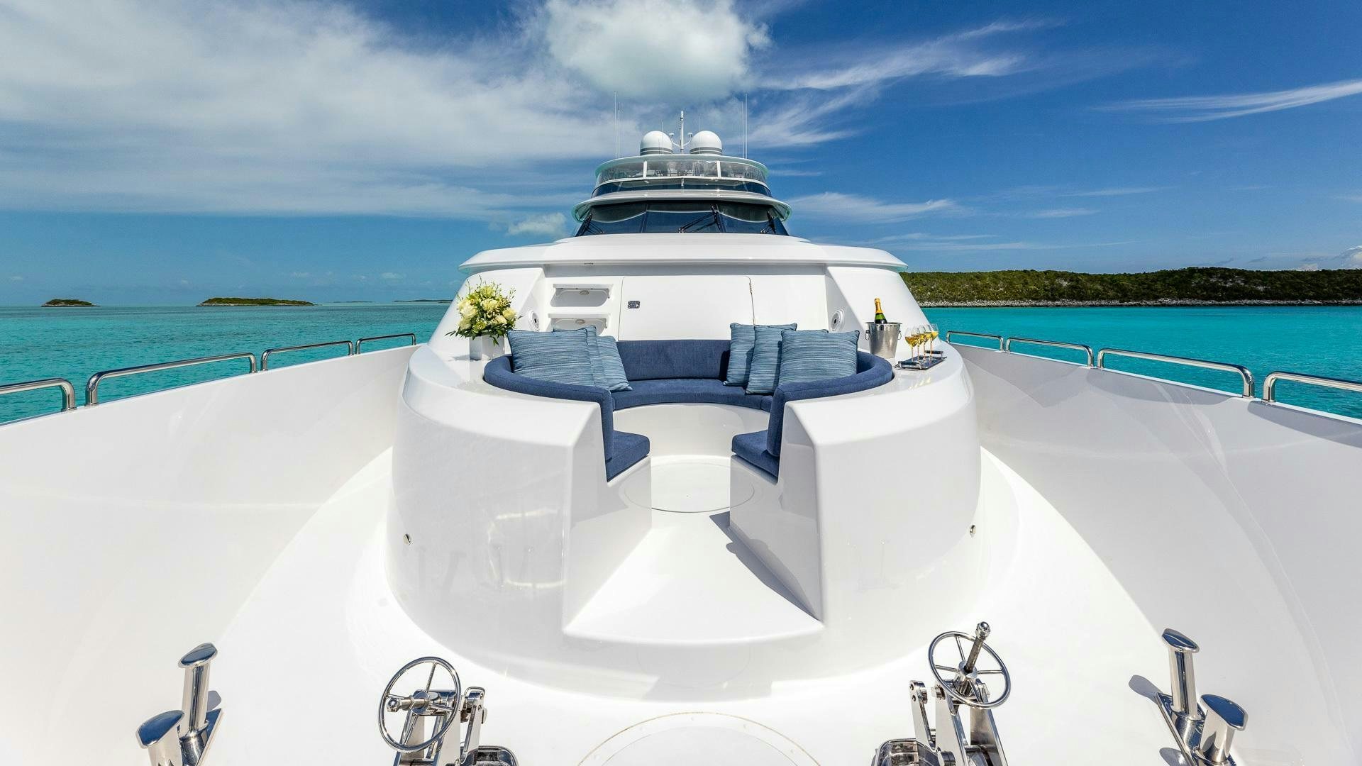 a white boat on a white surface aboard NO SHORTCUTS Yacht for Sale