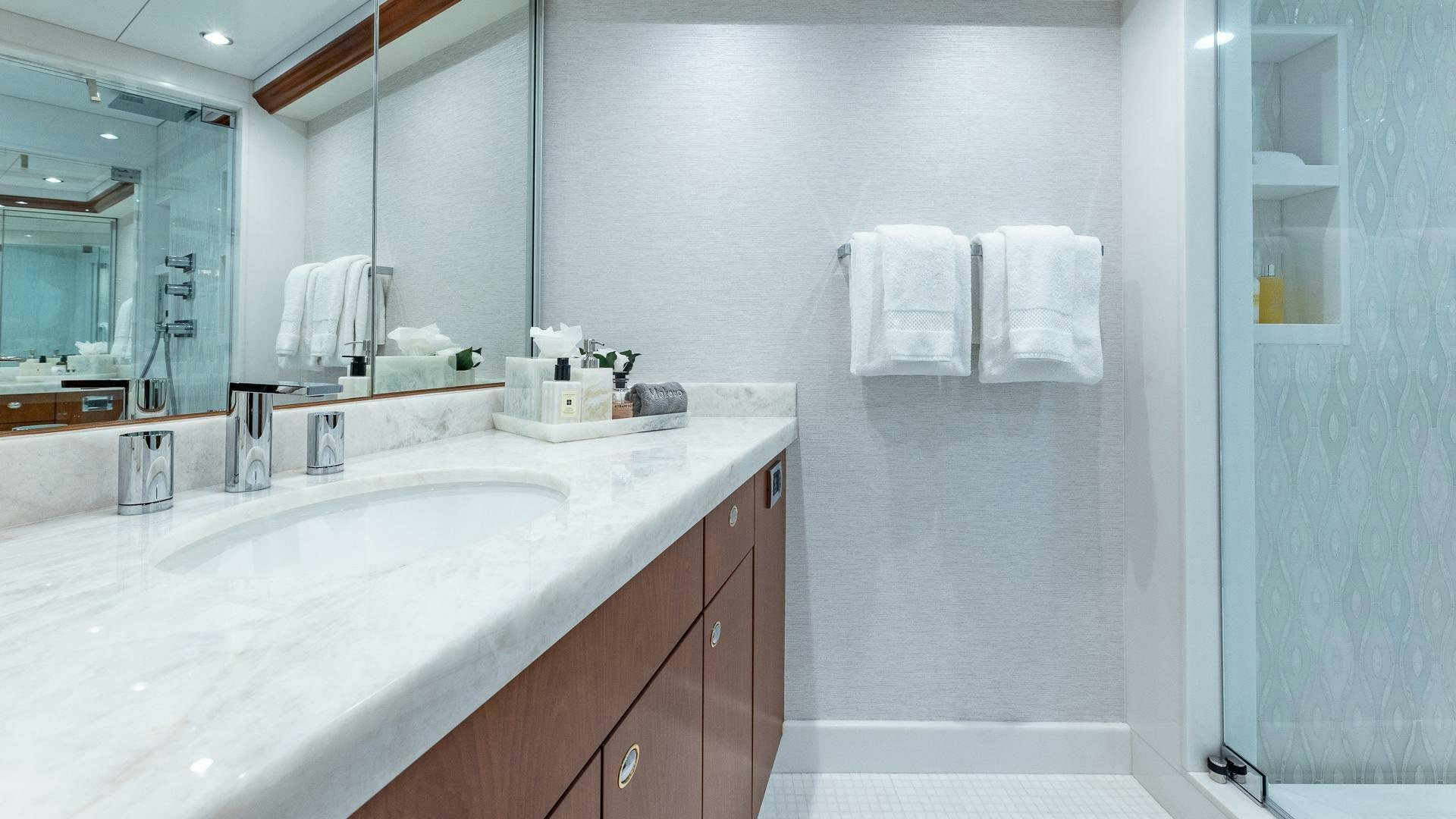 a bathroom with a large countertop aboard NO SHORTCUTS Yacht for Sale