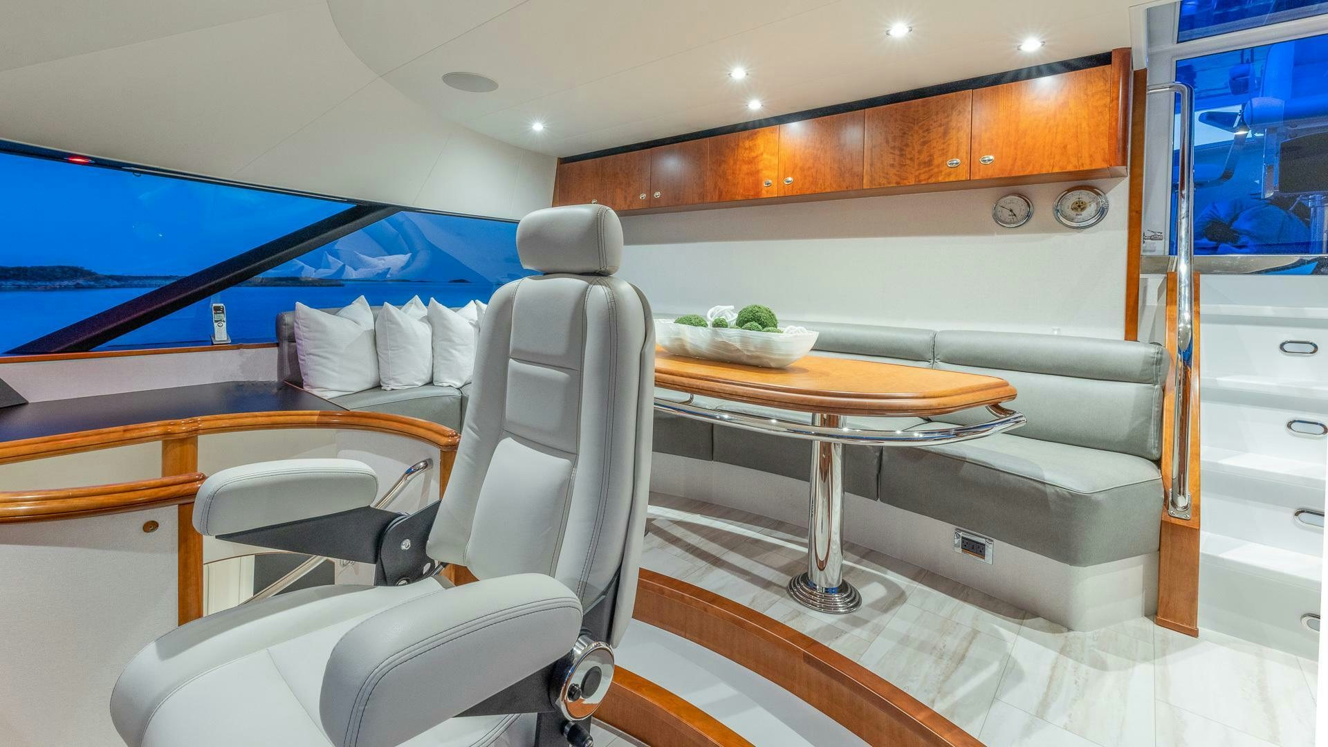 a room with a bed and desk aboard NO SHORTCUTS Yacht for Sale