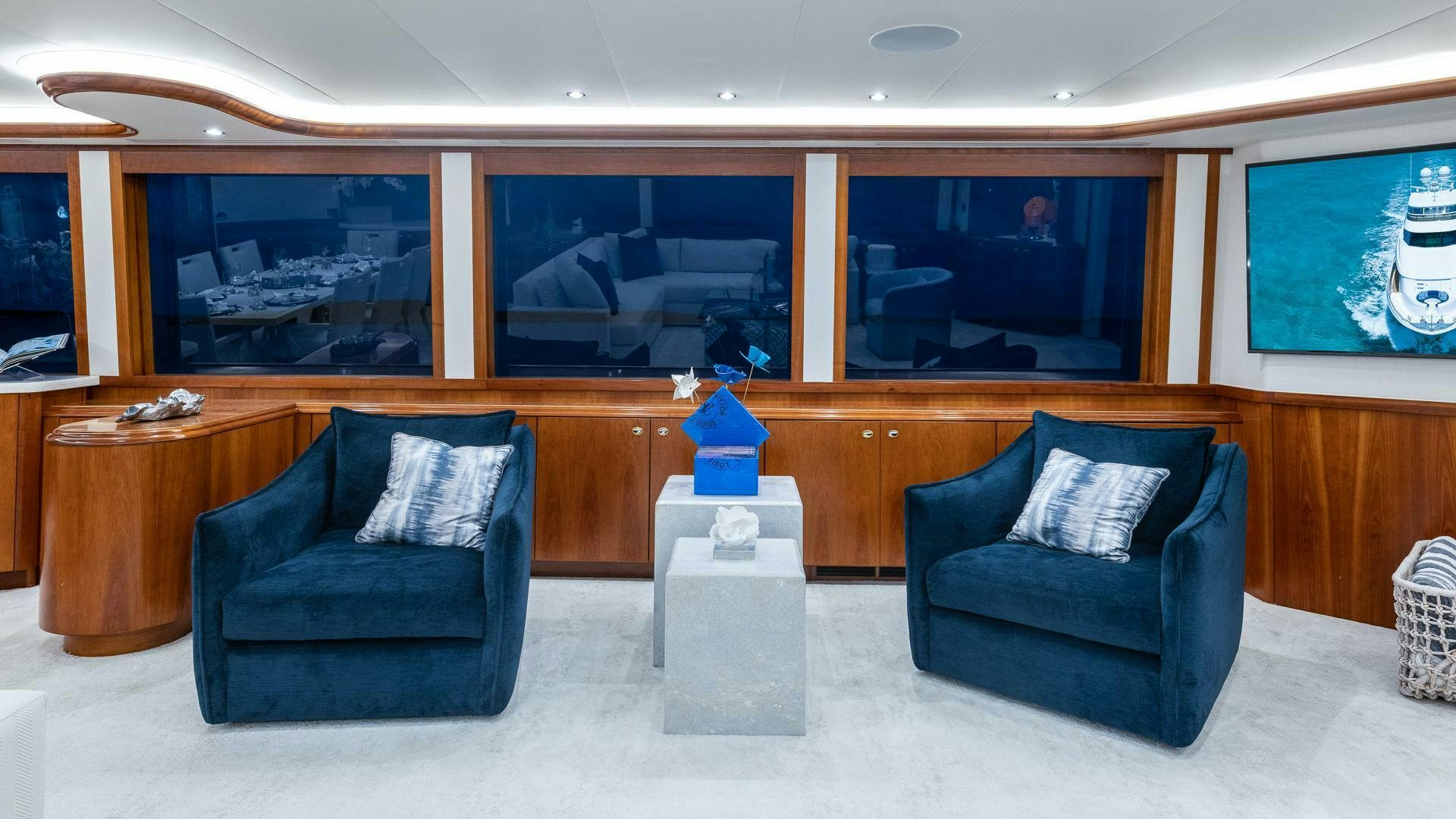 a room with a couch and a table aboard NO SHORTCUTS Yacht for Sale