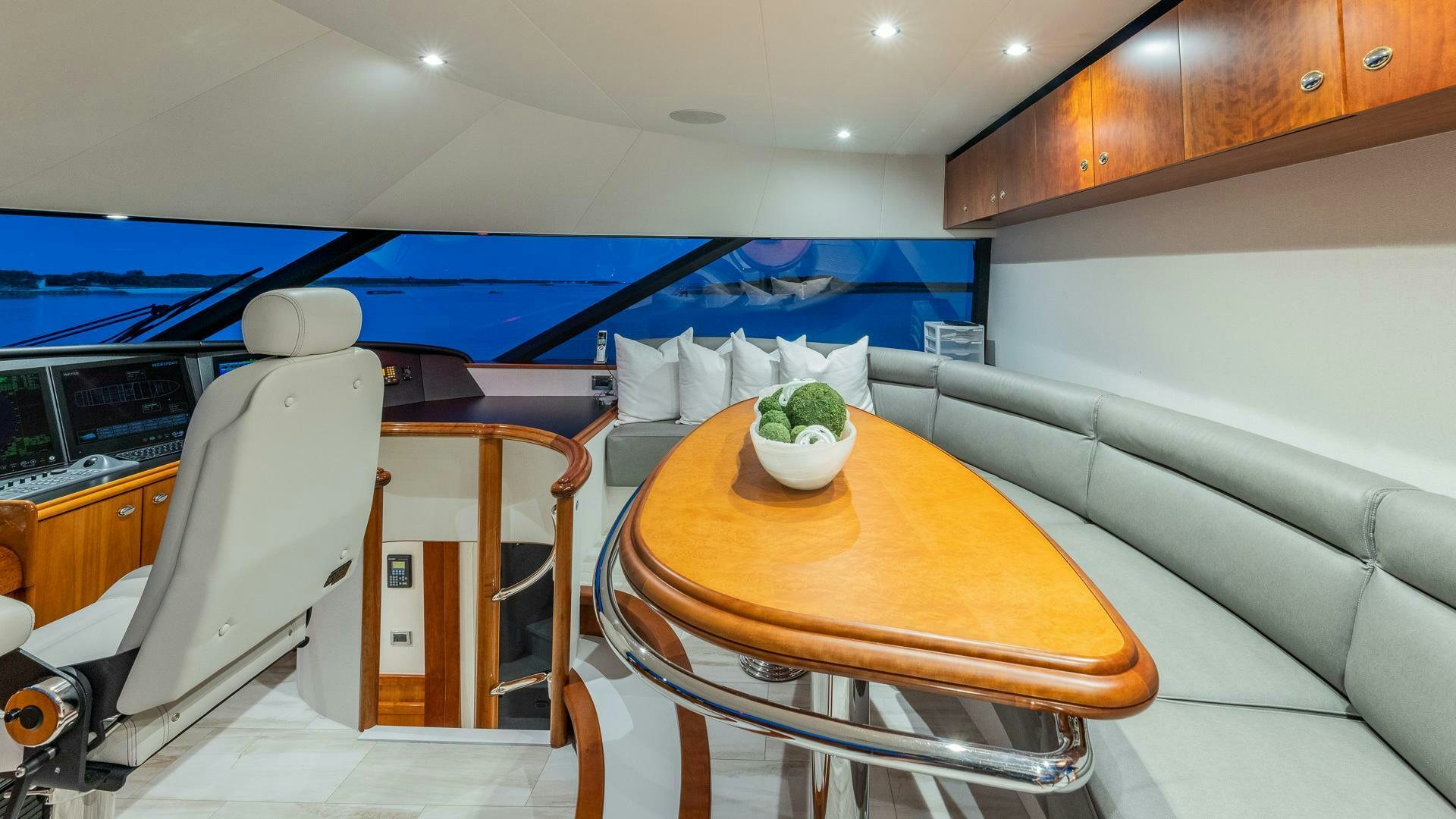 a room with a table and chairs aboard NO SHORTCUTS Yacht for Sale