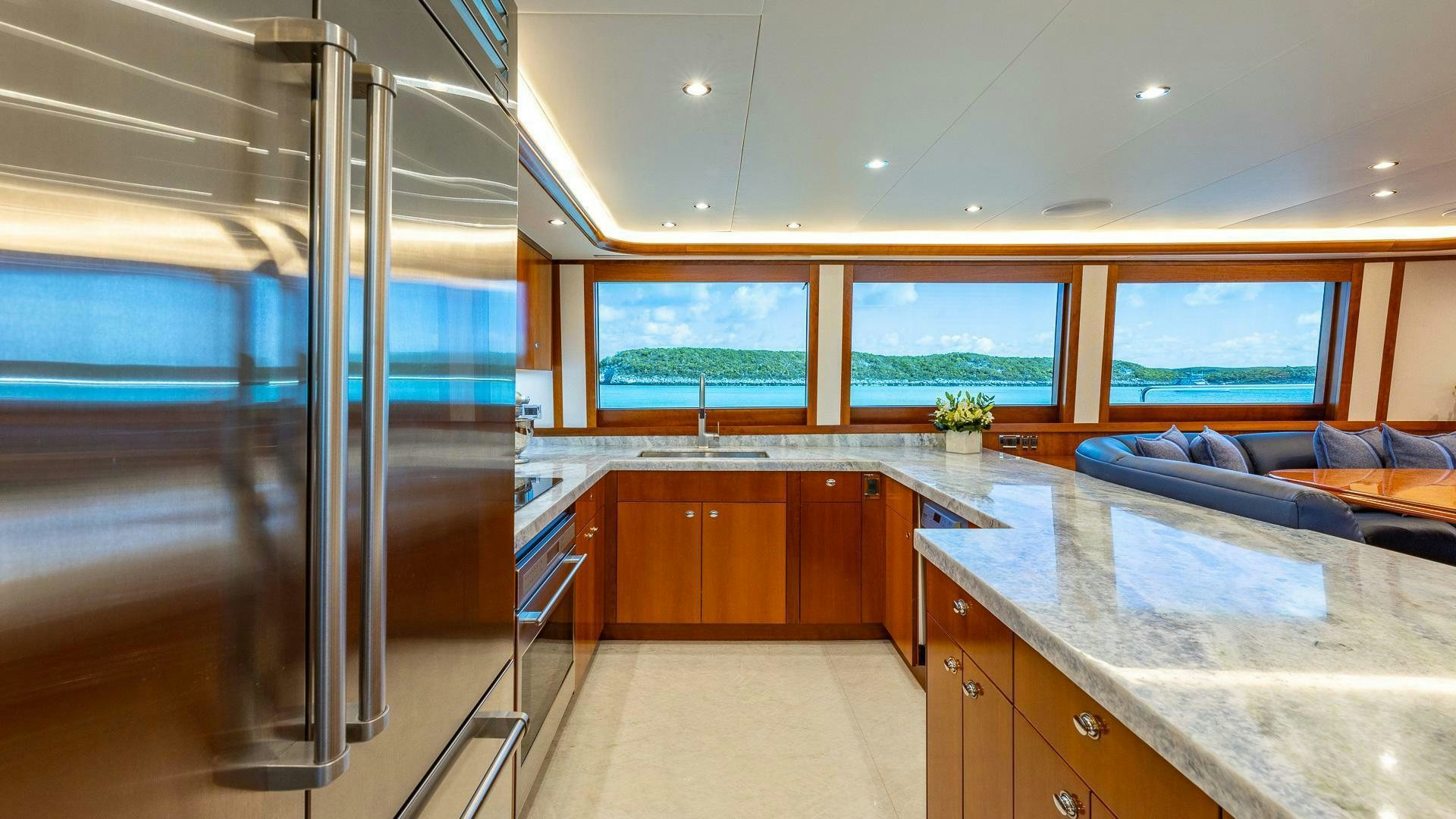 a large kitchen with glass doors aboard NO SHORTCUTS Yacht for Sale