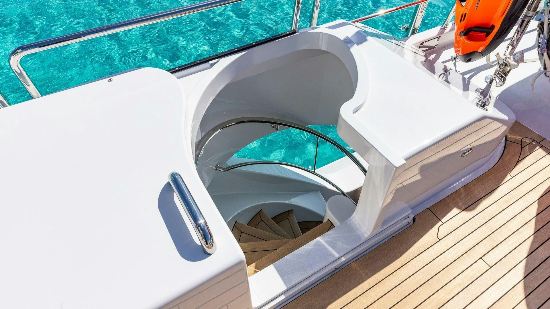 a white car with a door open aboard NO SHORTCUTS Yacht for Sale