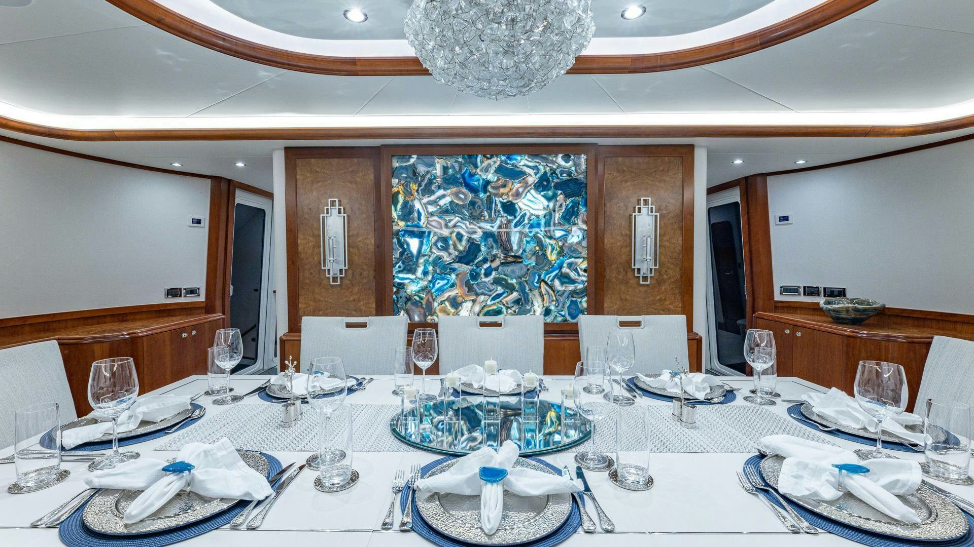 a table set for a dinner party aboard NO SHORTCUTS Yacht for Sale