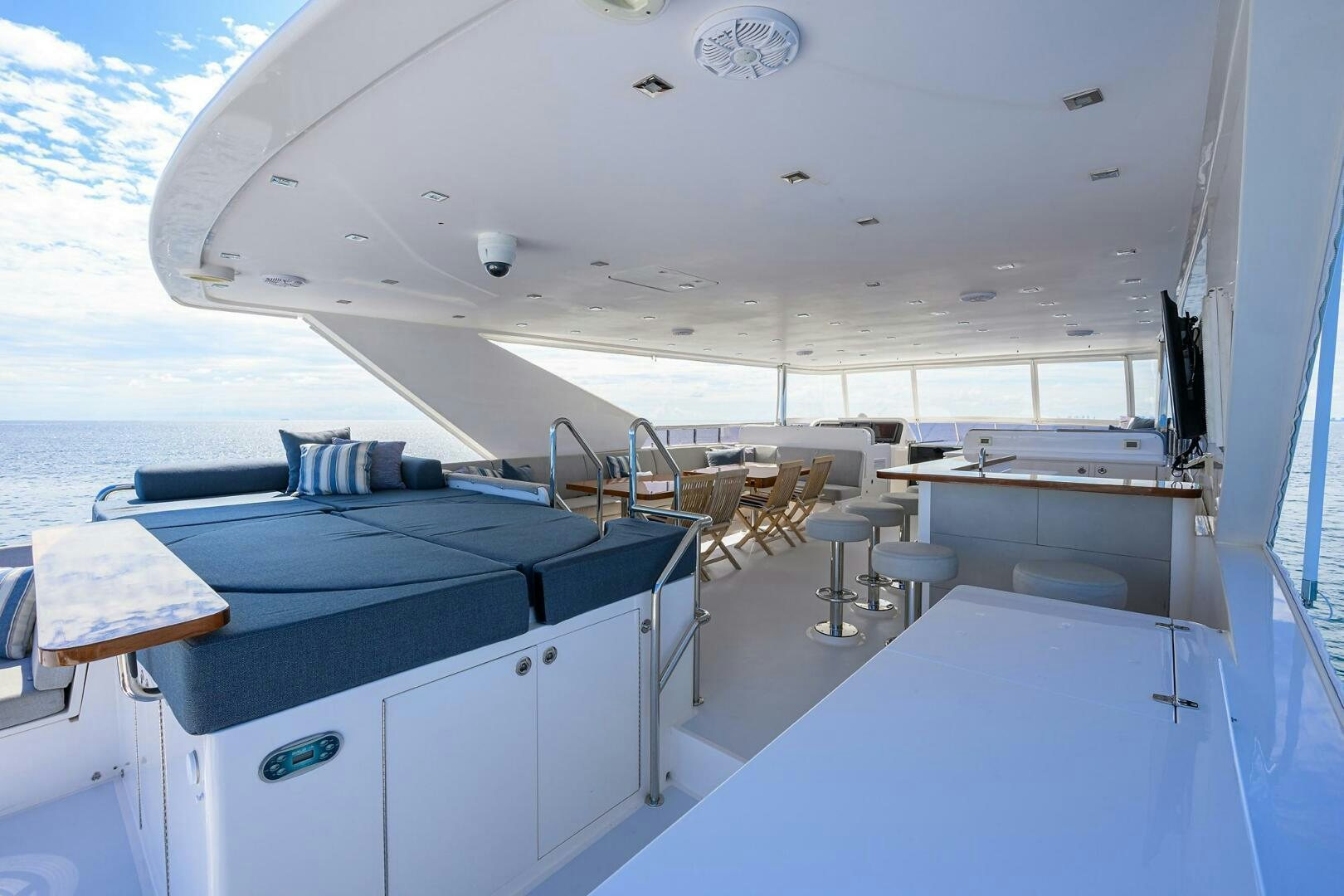 a room with a table and chairs aboard SECOND AMENDMENT Yacht for Sale