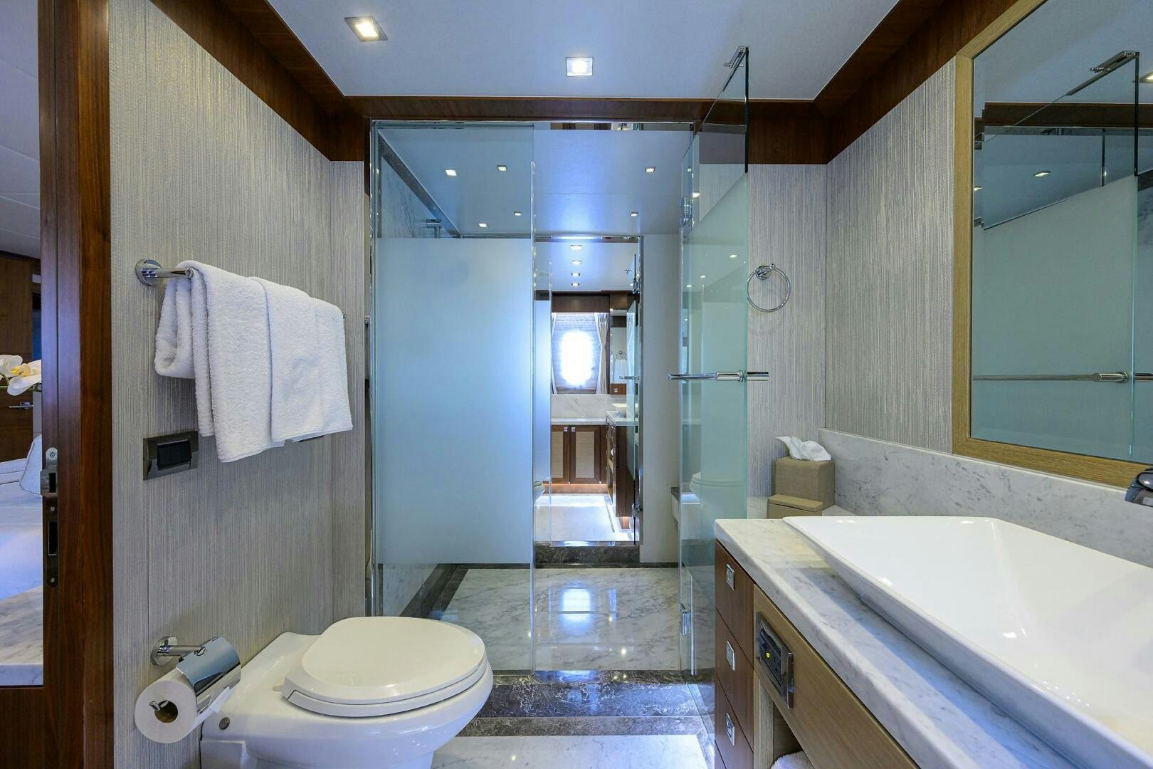 a bathroom with a sink toilet and a bathtub aboard SECOND AMENDMENT Yacht for Sale