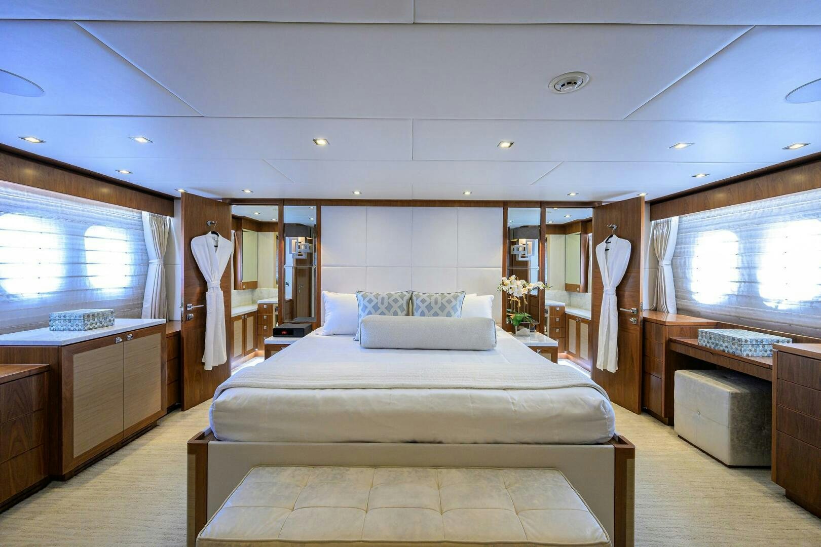 a bedroom with a bed and cabinets aboard SECOND AMENDMENT Yacht for Sale