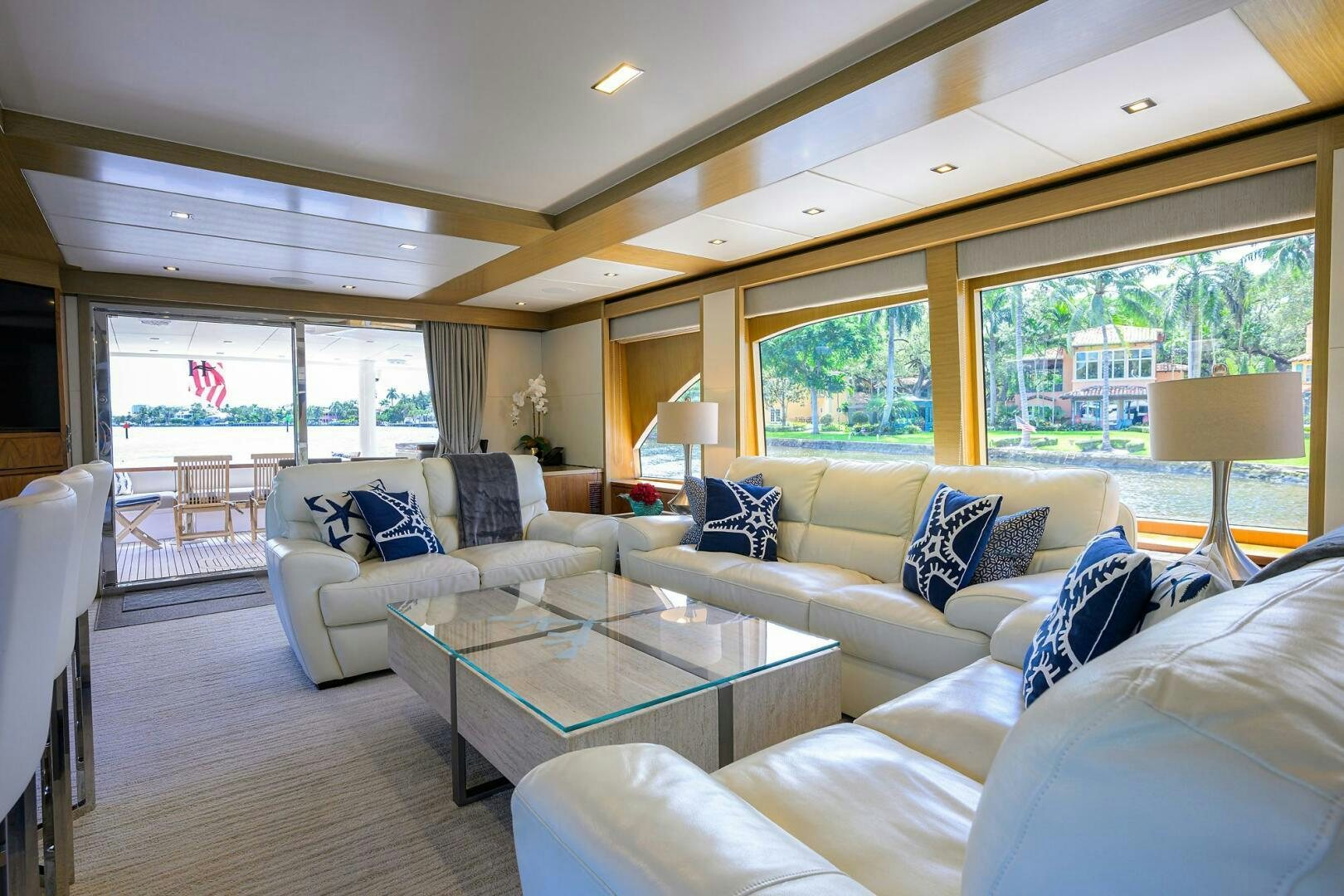 a living room with a large window aboard SECOND AMENDMENT Yacht for Sale
