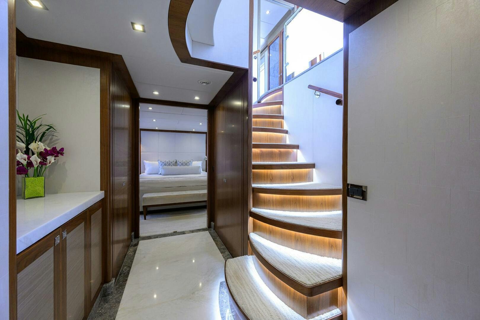 a hallway with a bed and a desk aboard SECOND AMENDMENT Yacht for Sale