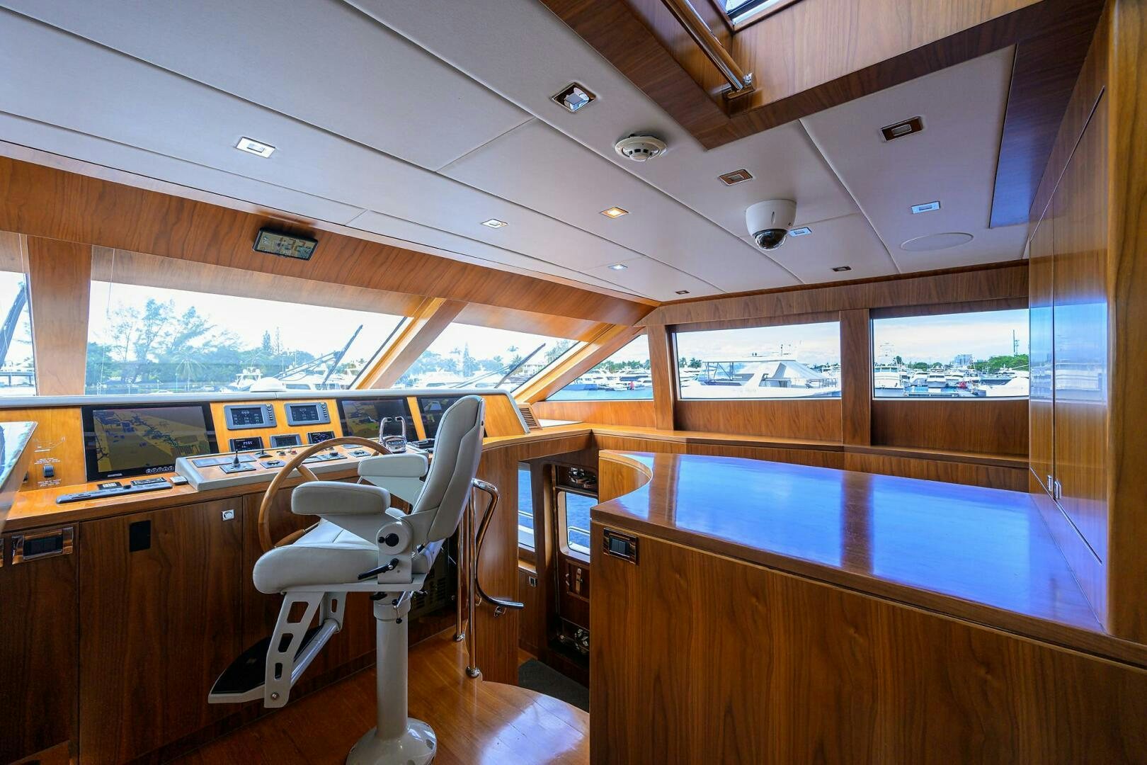 a room with a desk and chairs aboard SECOND AMENDMENT Yacht for Sale