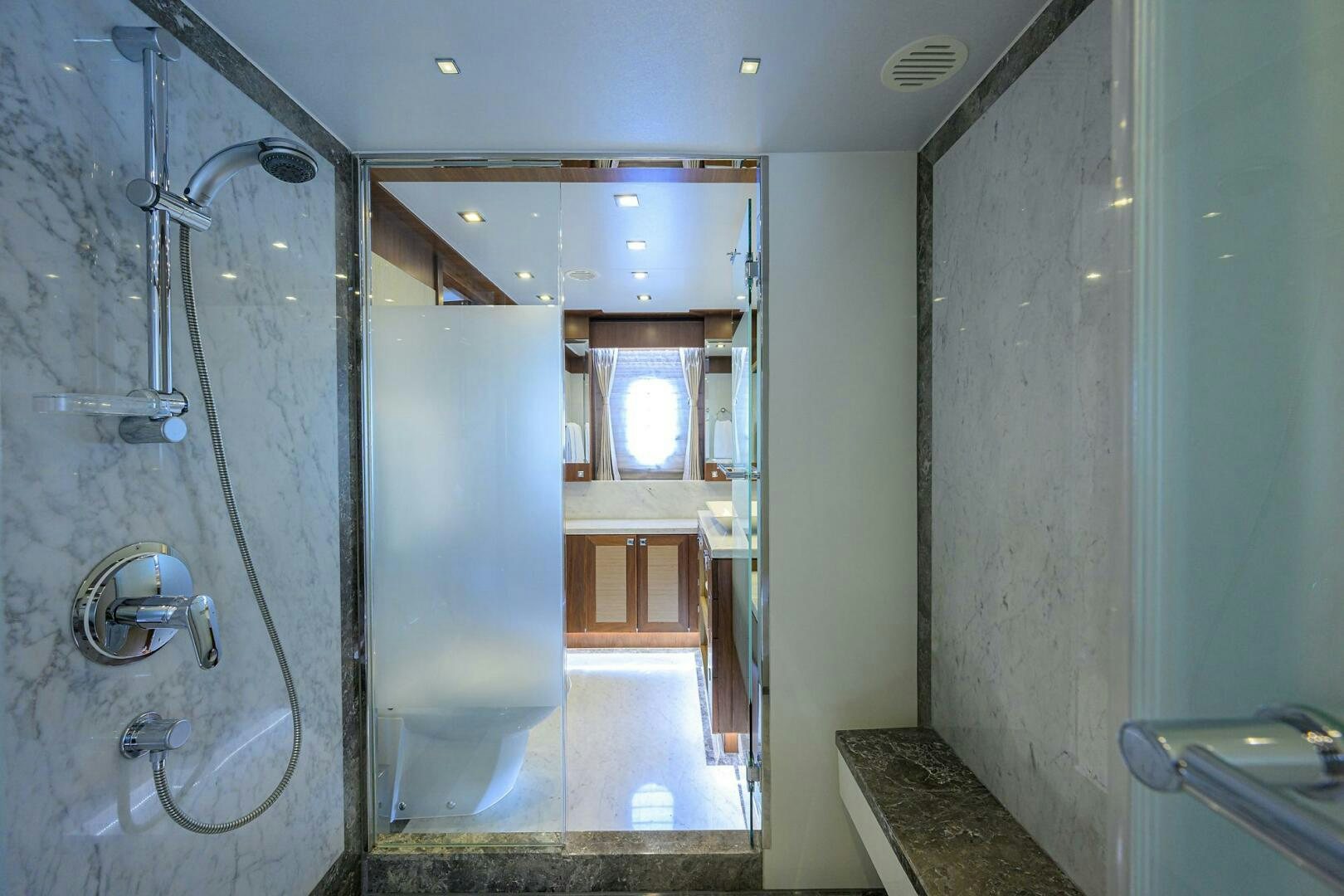 a bathroom with a shower and sink aboard SECOND AMENDMENT Yacht for Sale