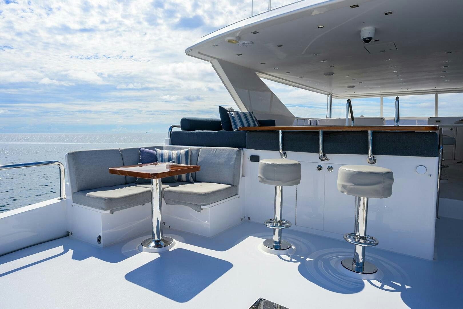 a room with a table and chairs aboard SECOND AMENDMENT Yacht for Sale