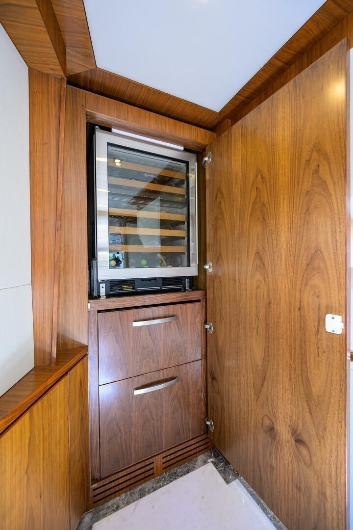a wooden cabinet with drawers aboard SECOND AMENDMENT Yacht for Sale