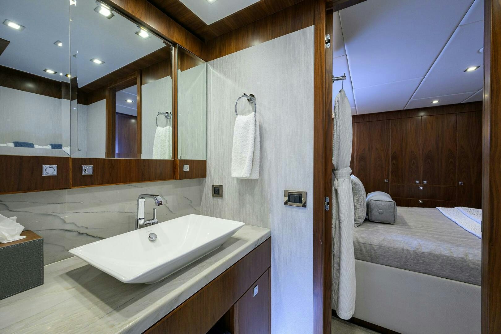 a bathroom with a large mirror aboard SECOND AMENDMENT Yacht for Sale