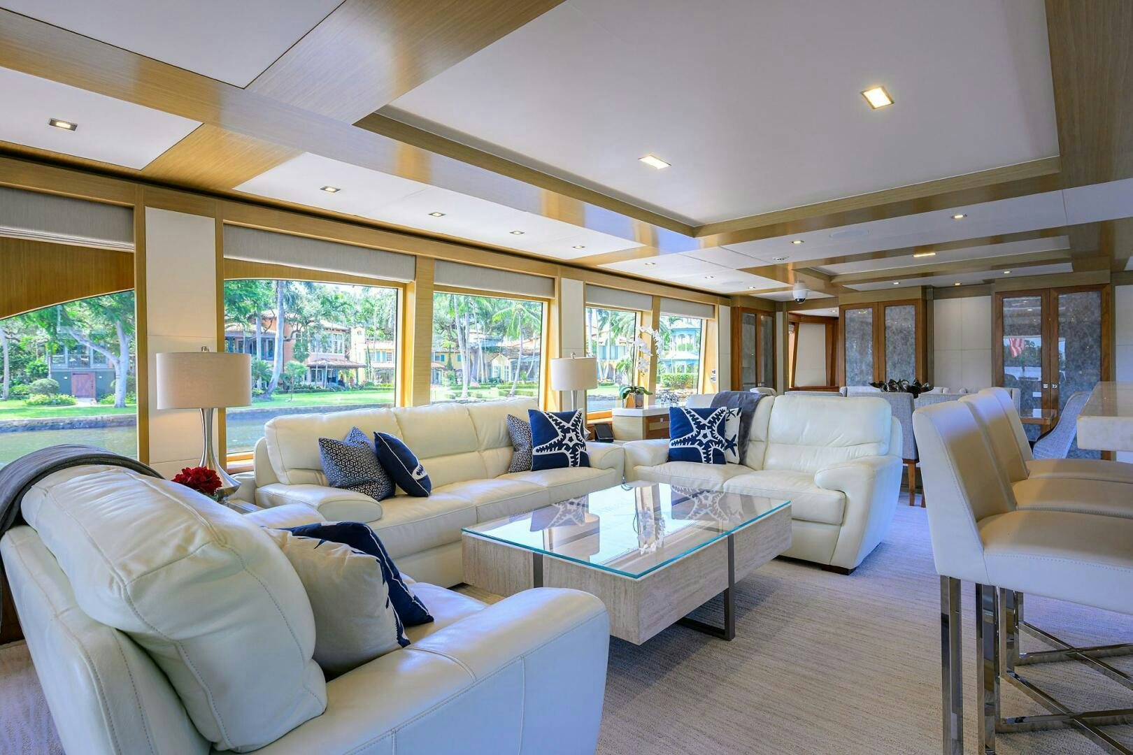 a living room with a large window aboard SECOND AMENDMENT Yacht for Sale