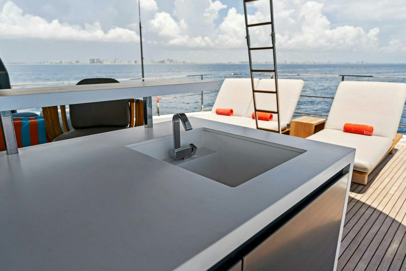 a boat on a deck aboard FAMILIA Yacht for Sale