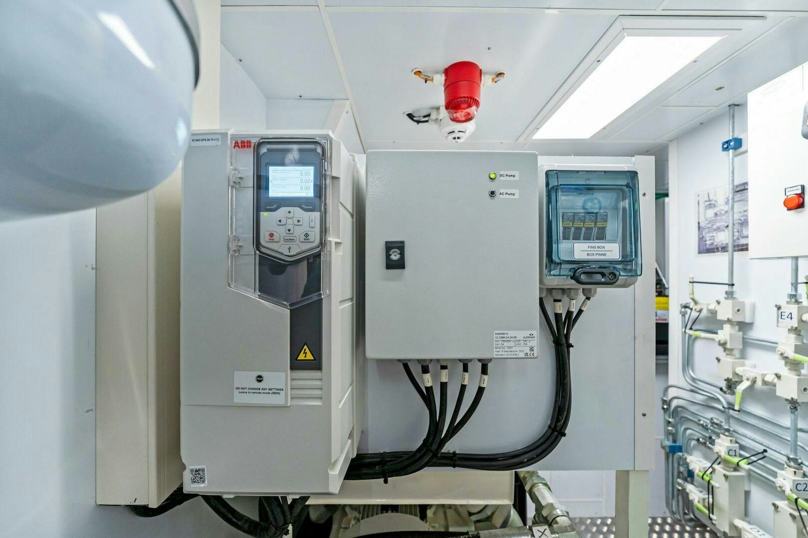 a machine in a room aboard FAMILIA Yacht for Sale