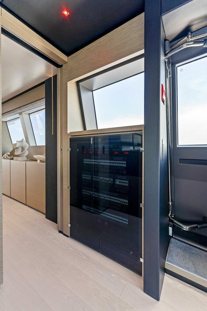 a large glass door aboard FAMILIA Yacht for Sale