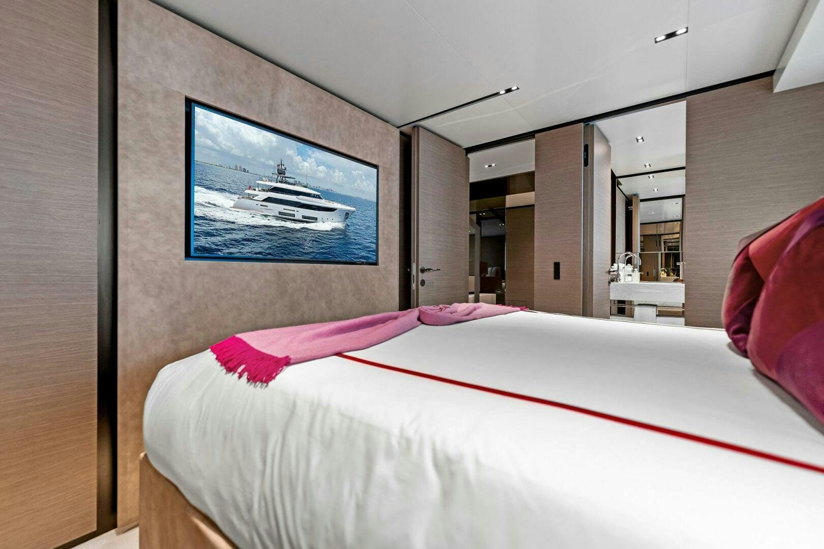 a bed in a room aboard FAMILIA Yacht for Sale