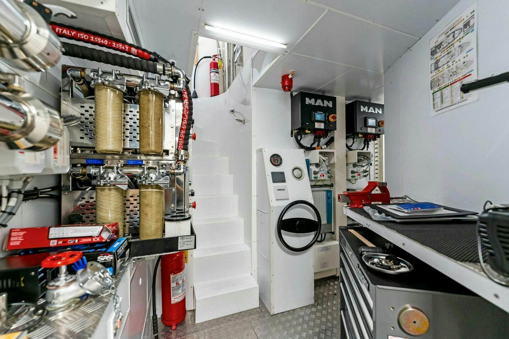 a room with a lot of equipment aboard FAMILIA Yacht for Sale
