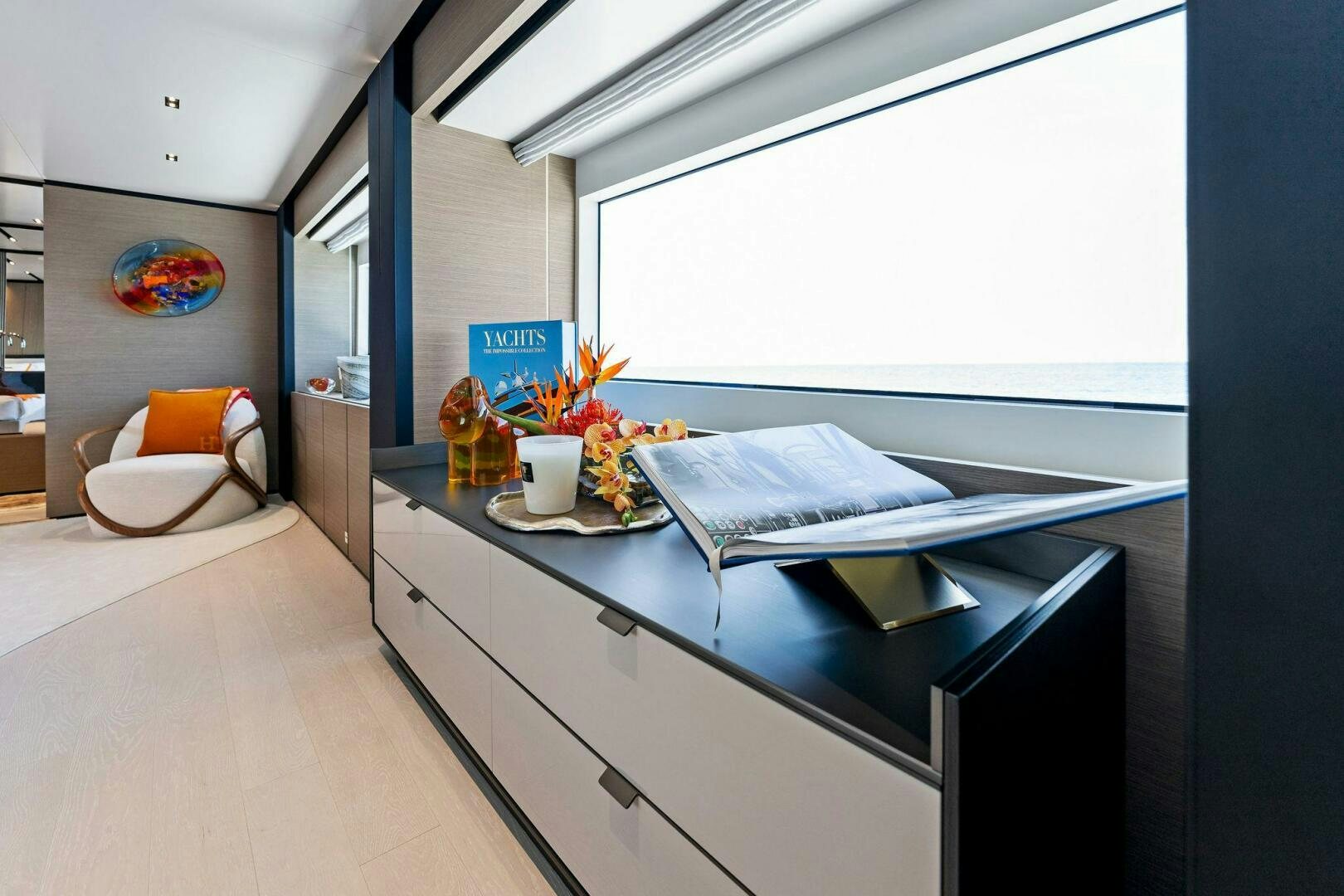 a room with a bed and a desk aboard FAMILIA Yacht for Sale