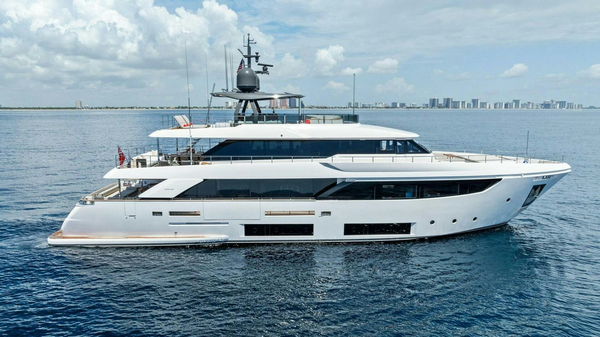 a white yacht in the water aboard FAMILIA Yacht for Sale