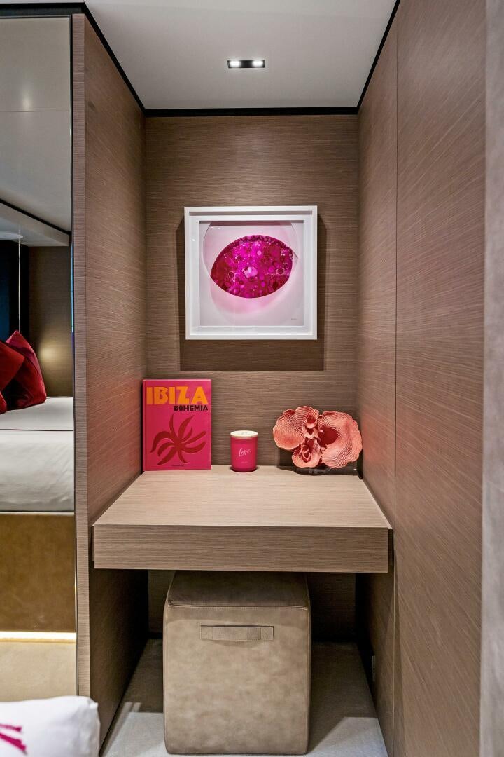 a table with a sign on it aboard FAMILIA Yacht for Sale