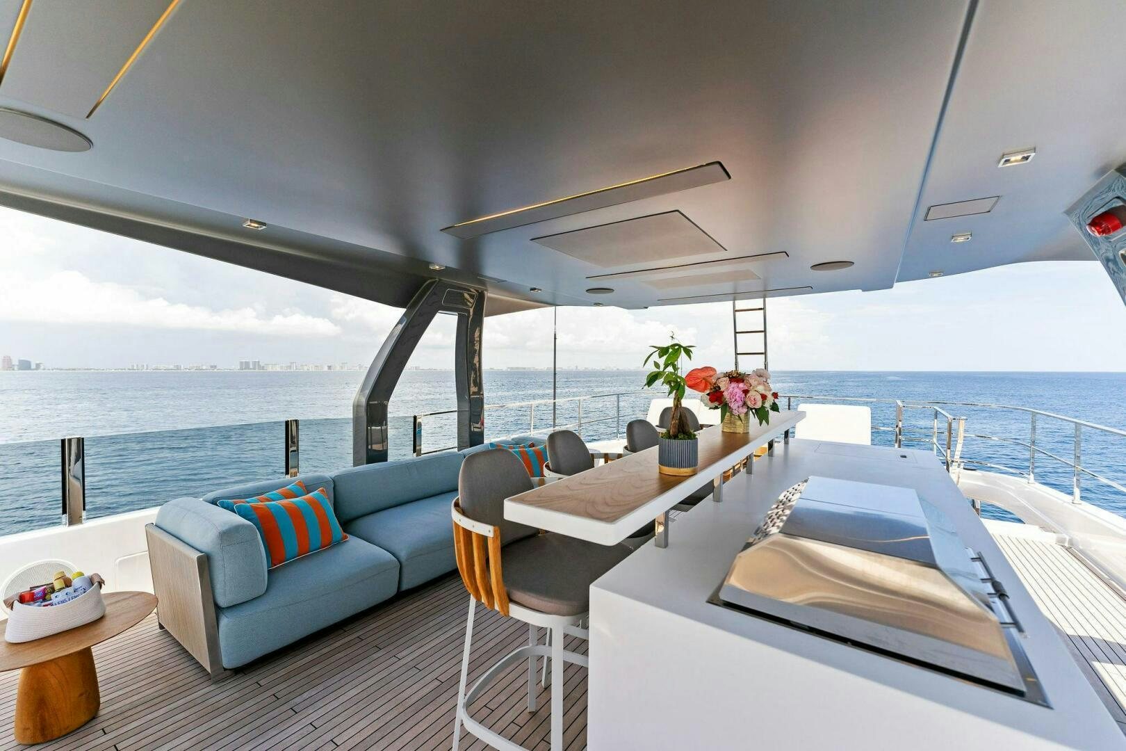 a room with a bed and a couch aboard FAMILIA Yacht for Sale