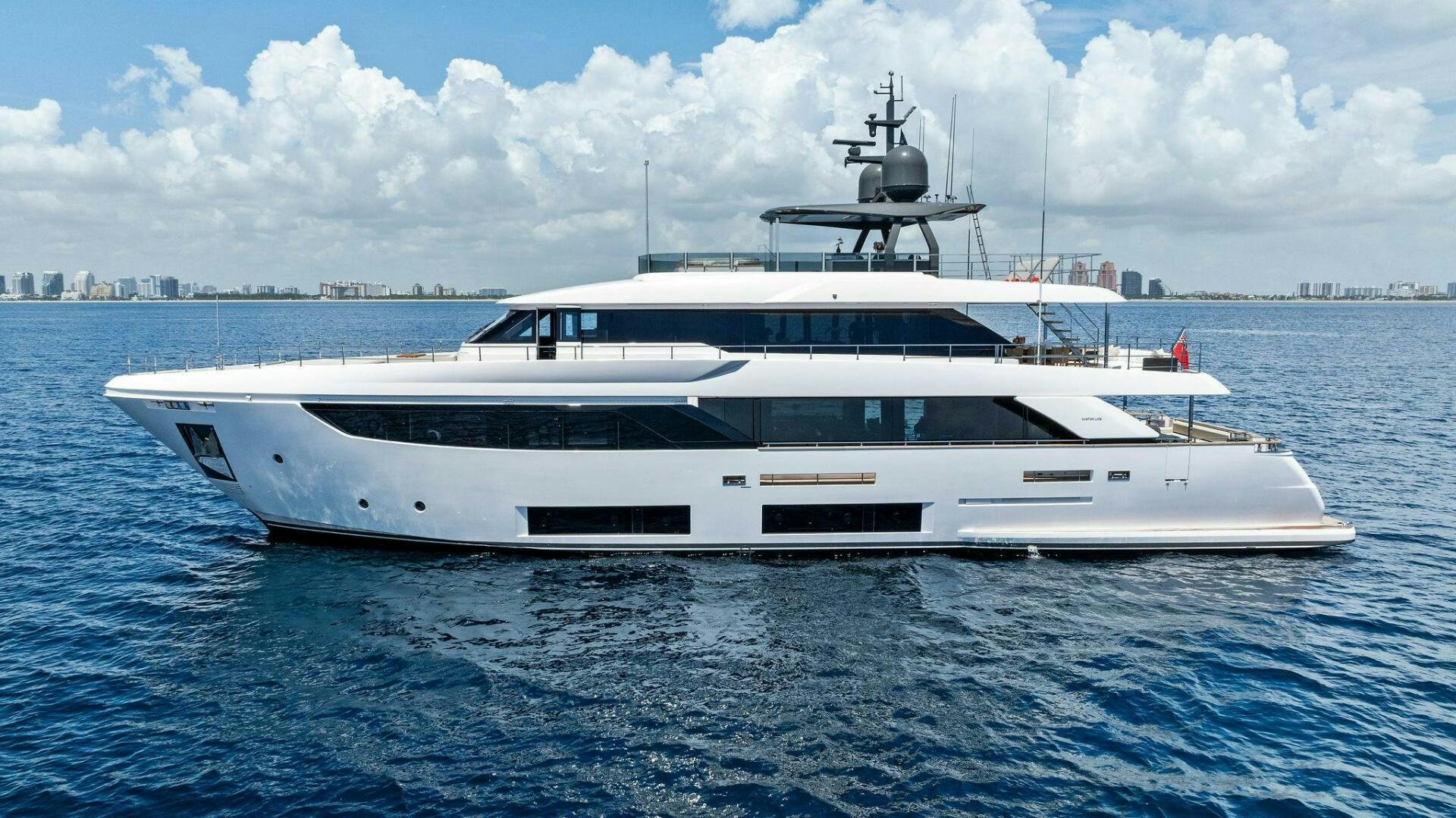 a white yacht in the water aboard FAMILIA Yacht for Sale
