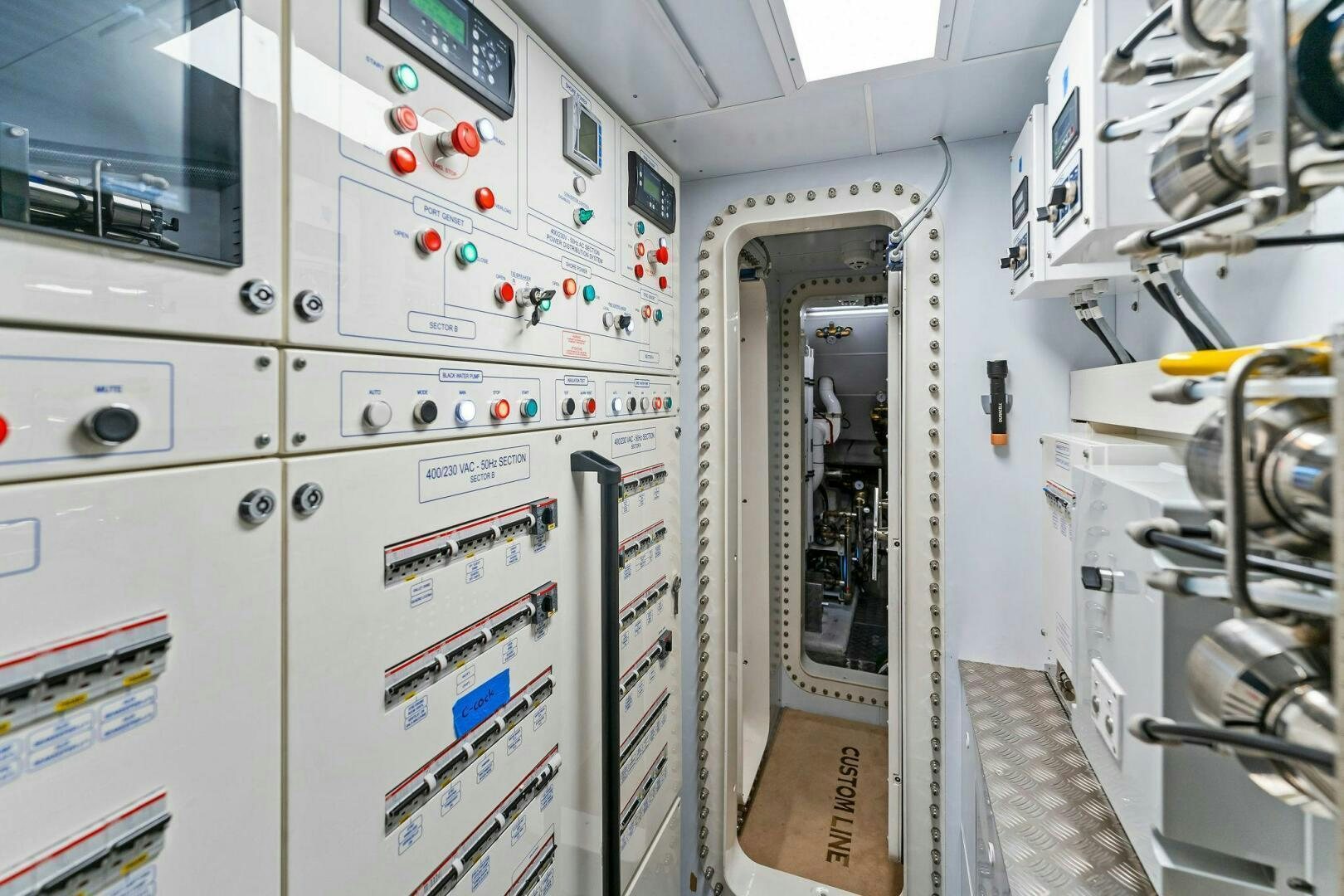 a room with several machines aboard FAMILIA Yacht for Sale