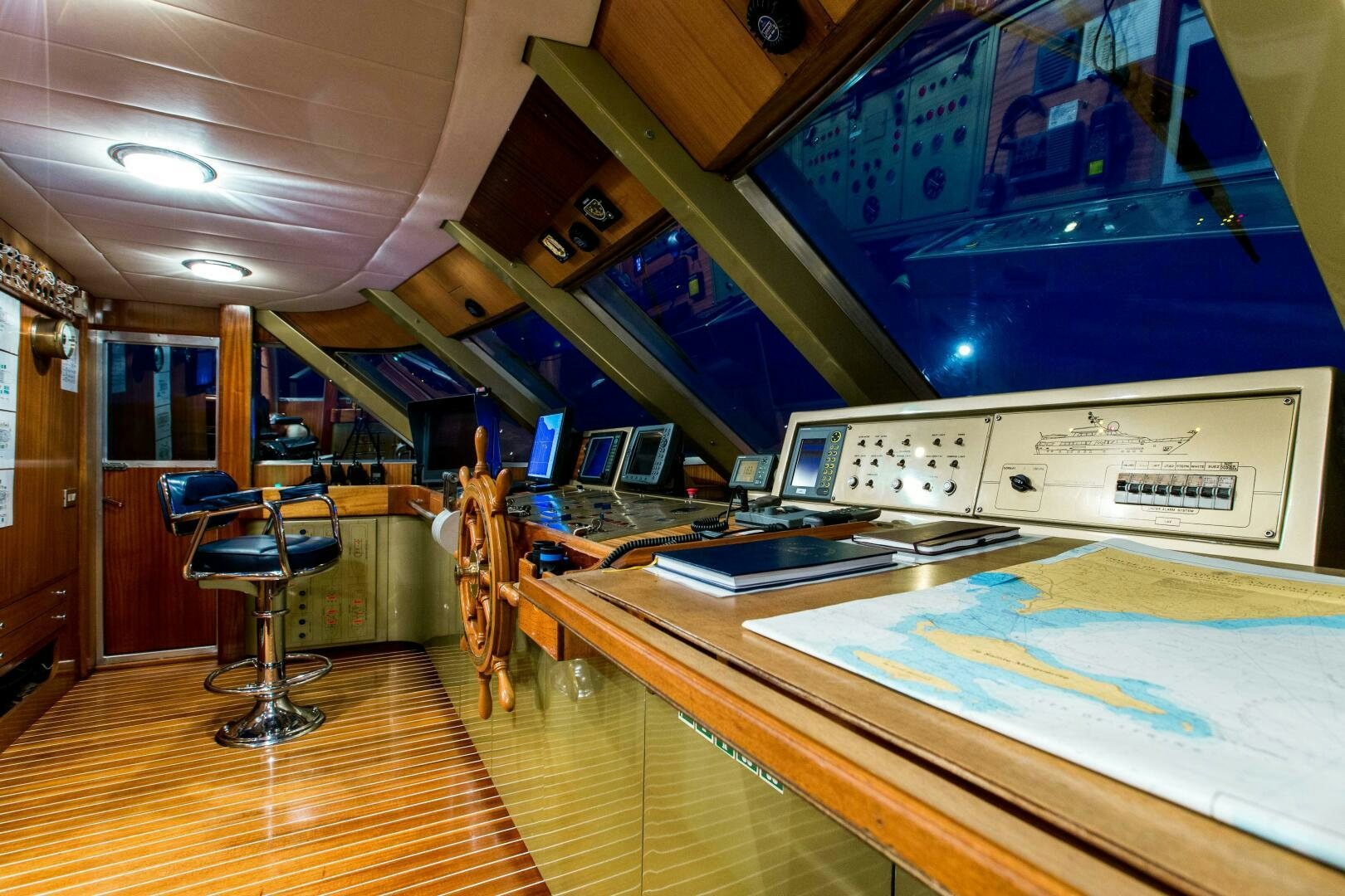 a room with a table and chairs aboard STAR OF THE SEA Yacht for Sale