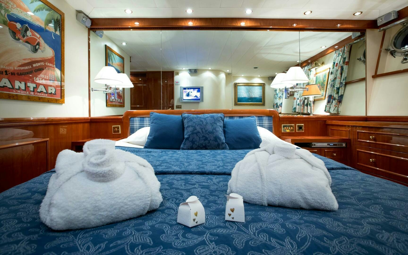 a bed with pillows on it aboard STAR OF THE SEA Yacht for Sale