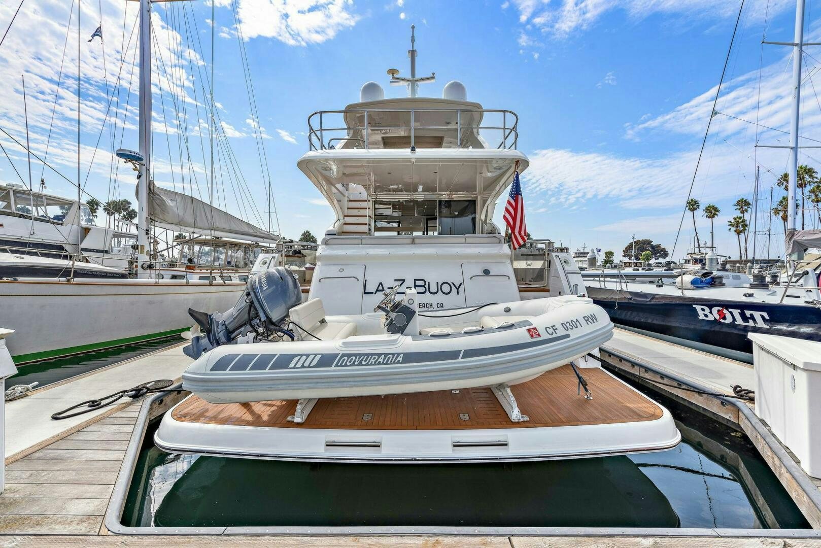 a boat docked at a pier aboard LA-Z-BUOY Yacht for Sale