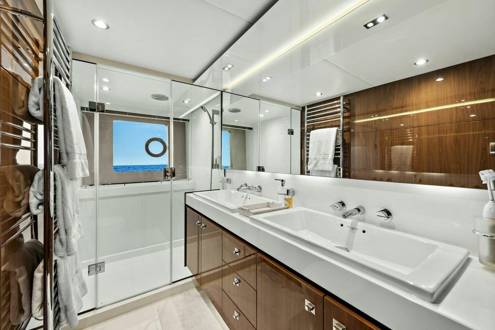a bathroom with a large mirror aboard LA-Z-BUOY Yacht for Sale