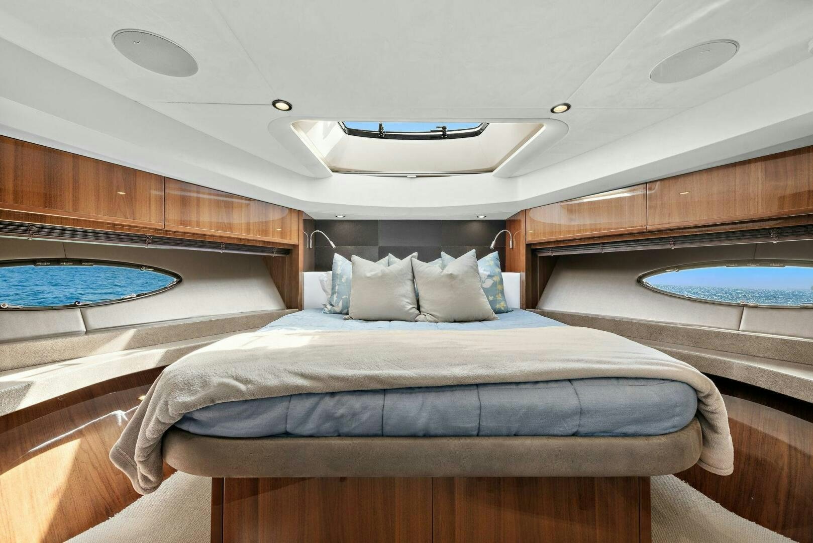 a room with a bed and a sink aboard LA-Z-BUOY Yacht for Sale