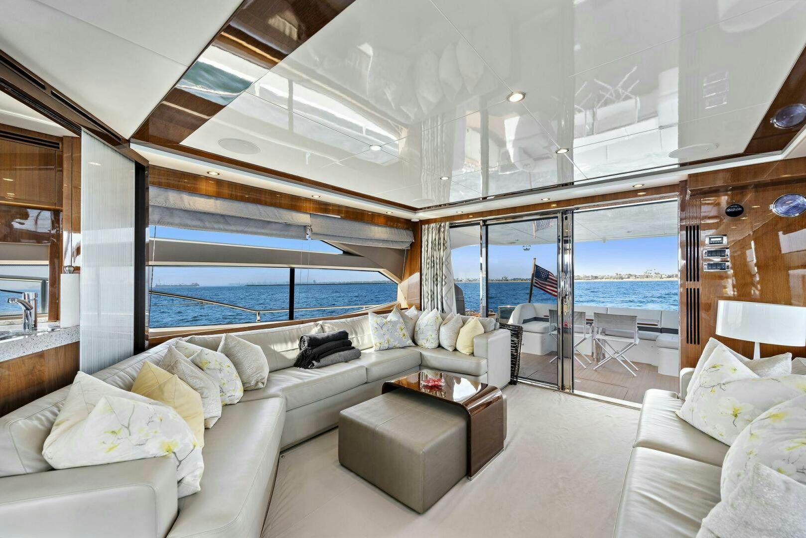 a living room with a large window aboard LA-Z-BUOY Yacht for Sale