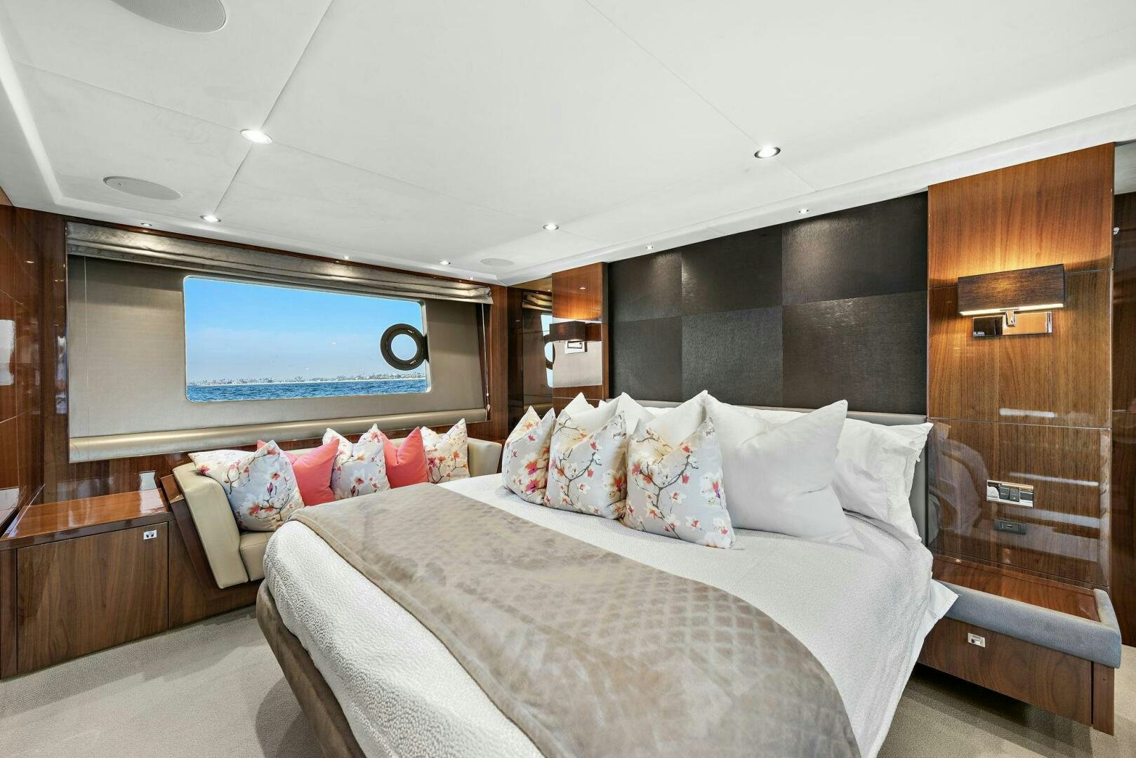 a room with a bed and a television aboard LA-Z-BUOY Yacht for Sale